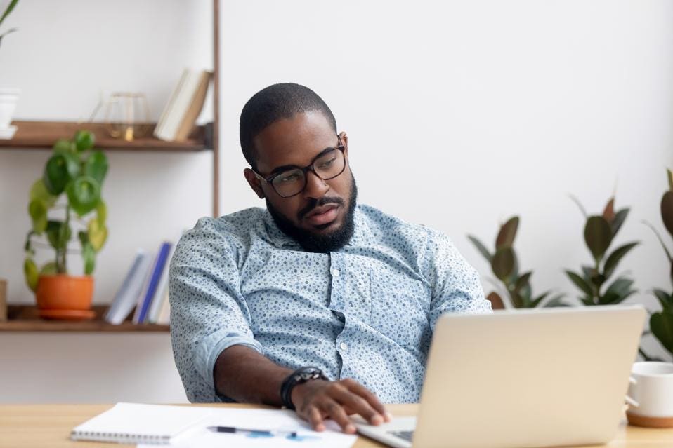 A man looking depressed due to field sales challenges he's facing