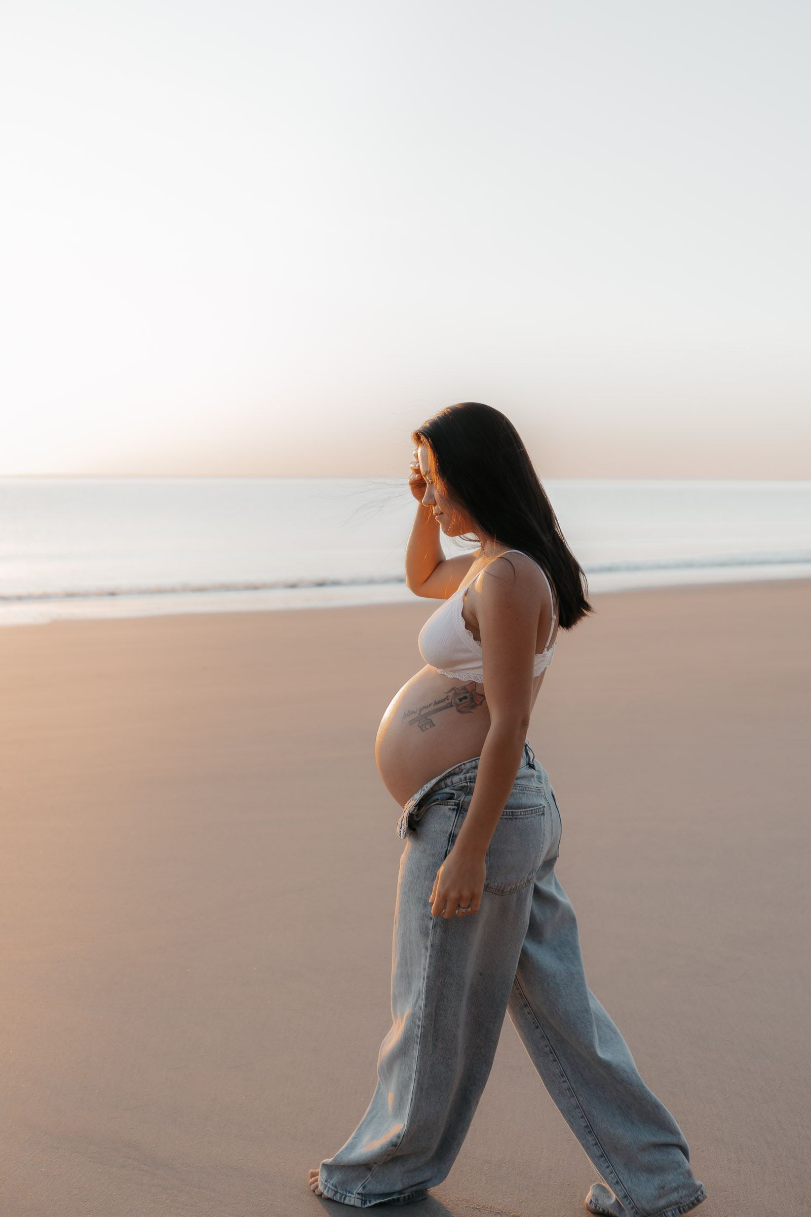 Maternity photo of pregnant mother at the beach in Mackay QLD