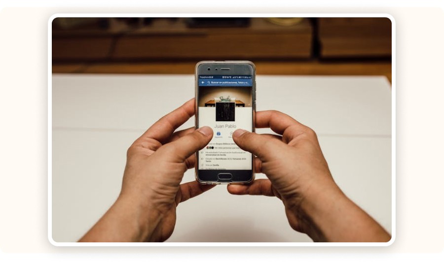 Smartphone displaying a personal Facebook page