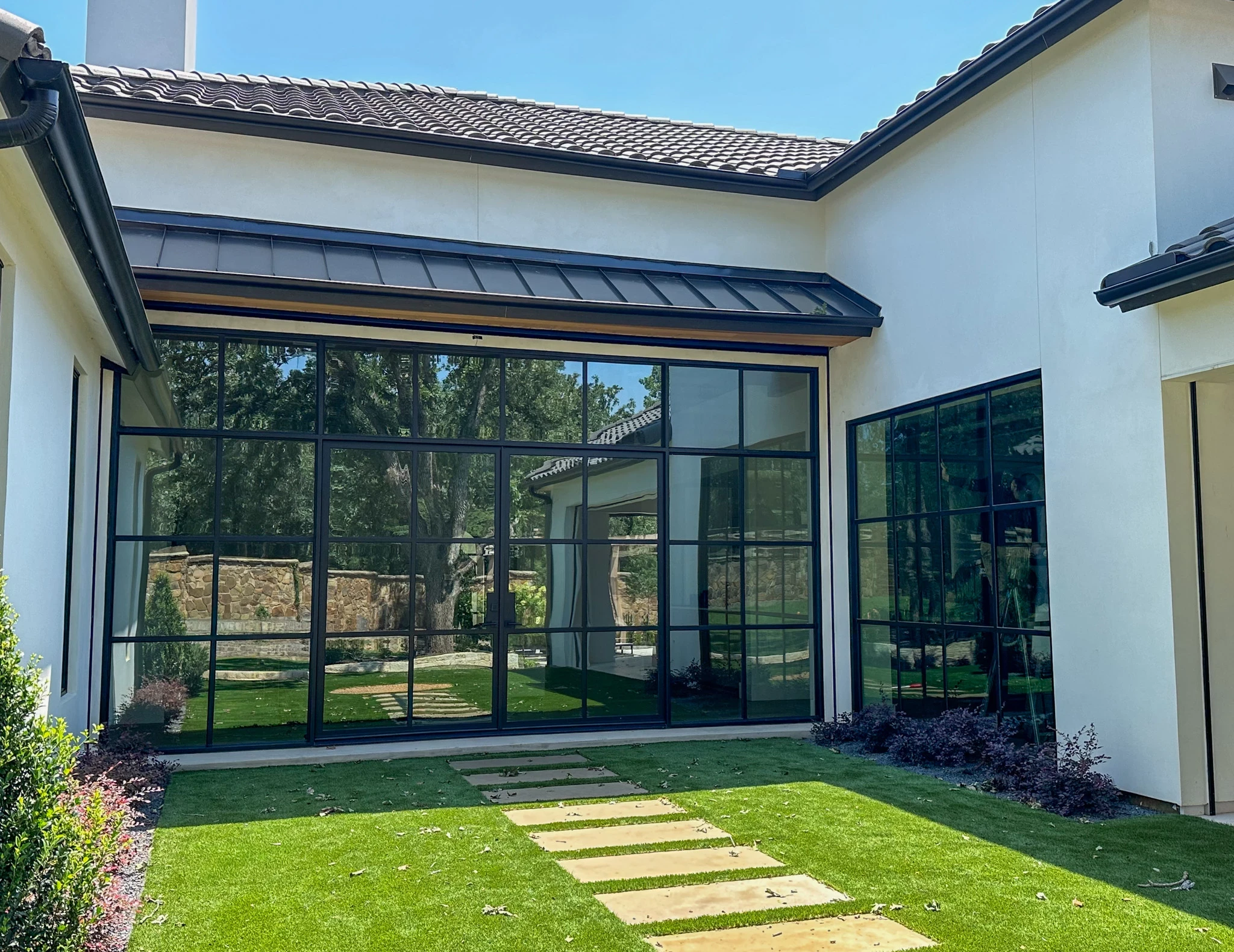 Traditional wrought iron double doors by M2 Metals Iron Doors DFW