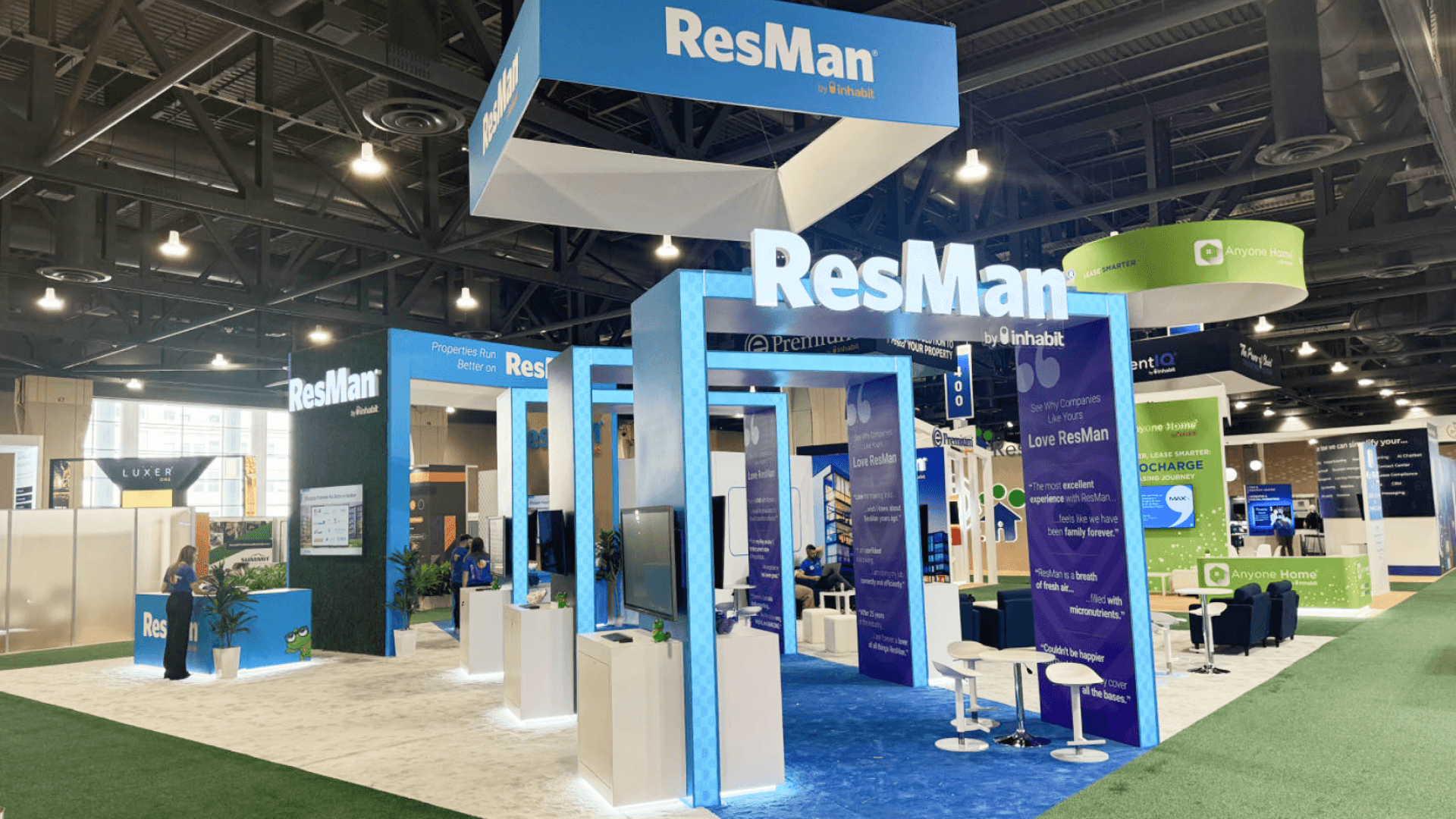 ResMan NAA 2024 island exhibit meeting lounge and conversation area inside large booth footprint
