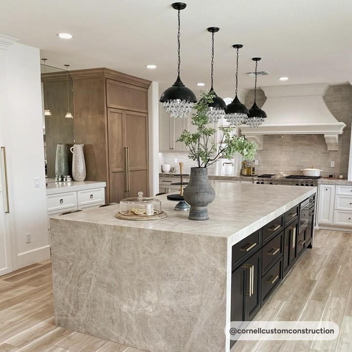 taj mahal quartzite countertop with dark cabinets