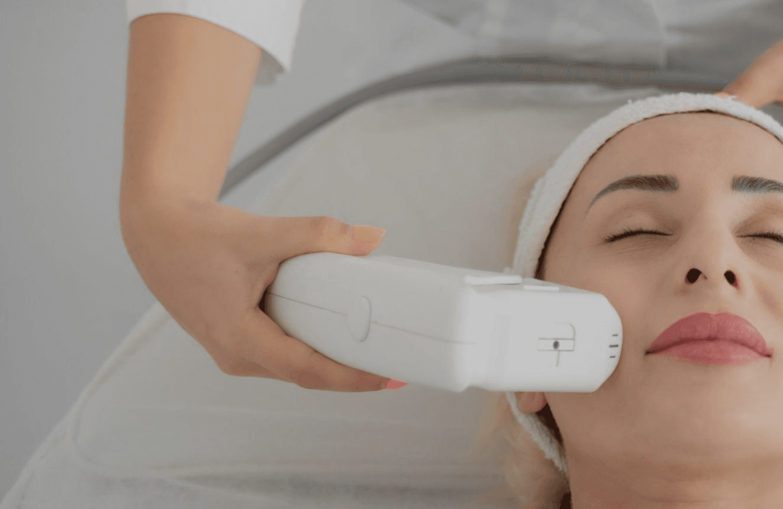 Woman receiving laser hair removal underarms as part of advanced body treatments for smoother, rejuvenated skin.