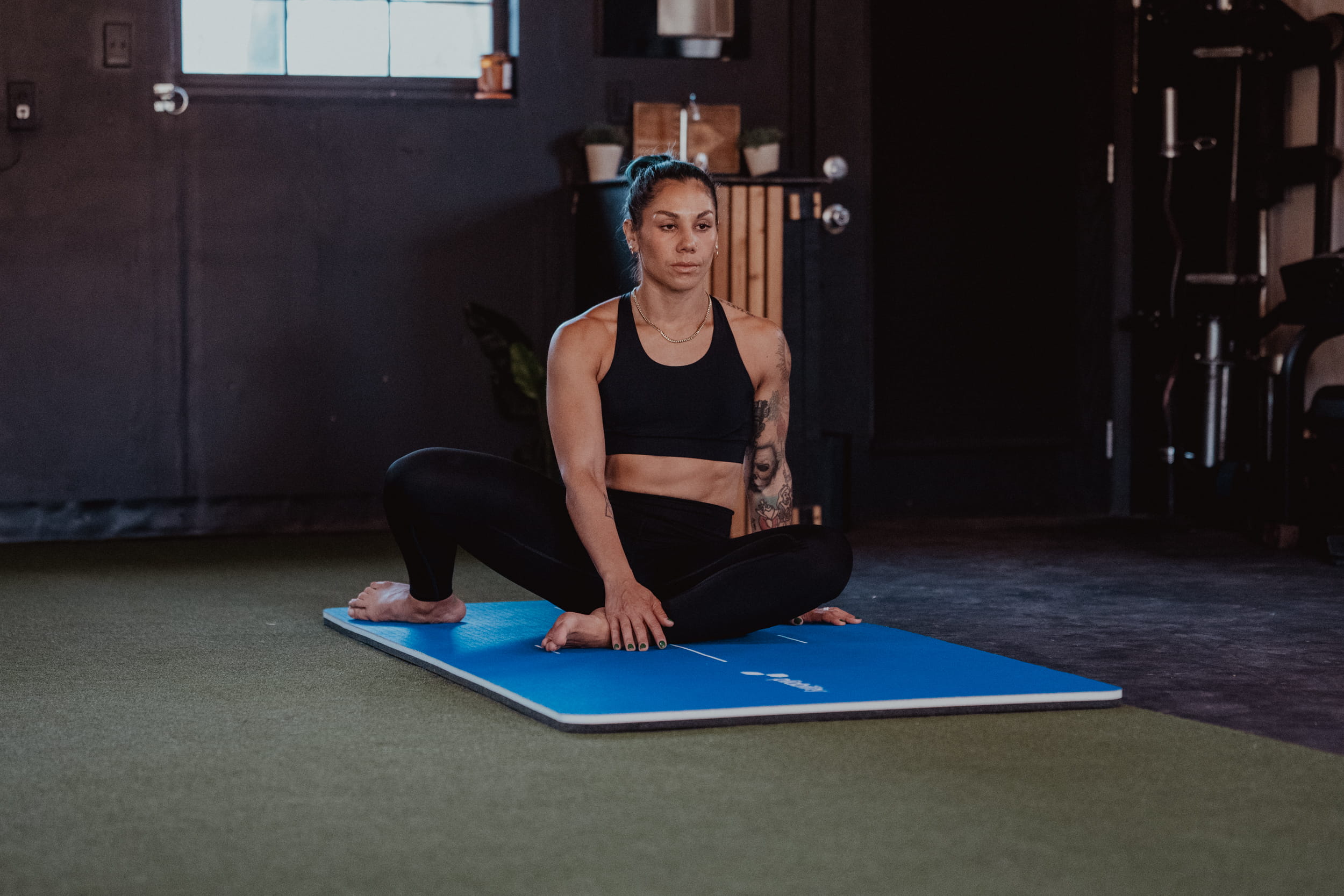 person on mat - Hip Stiffness Exercises