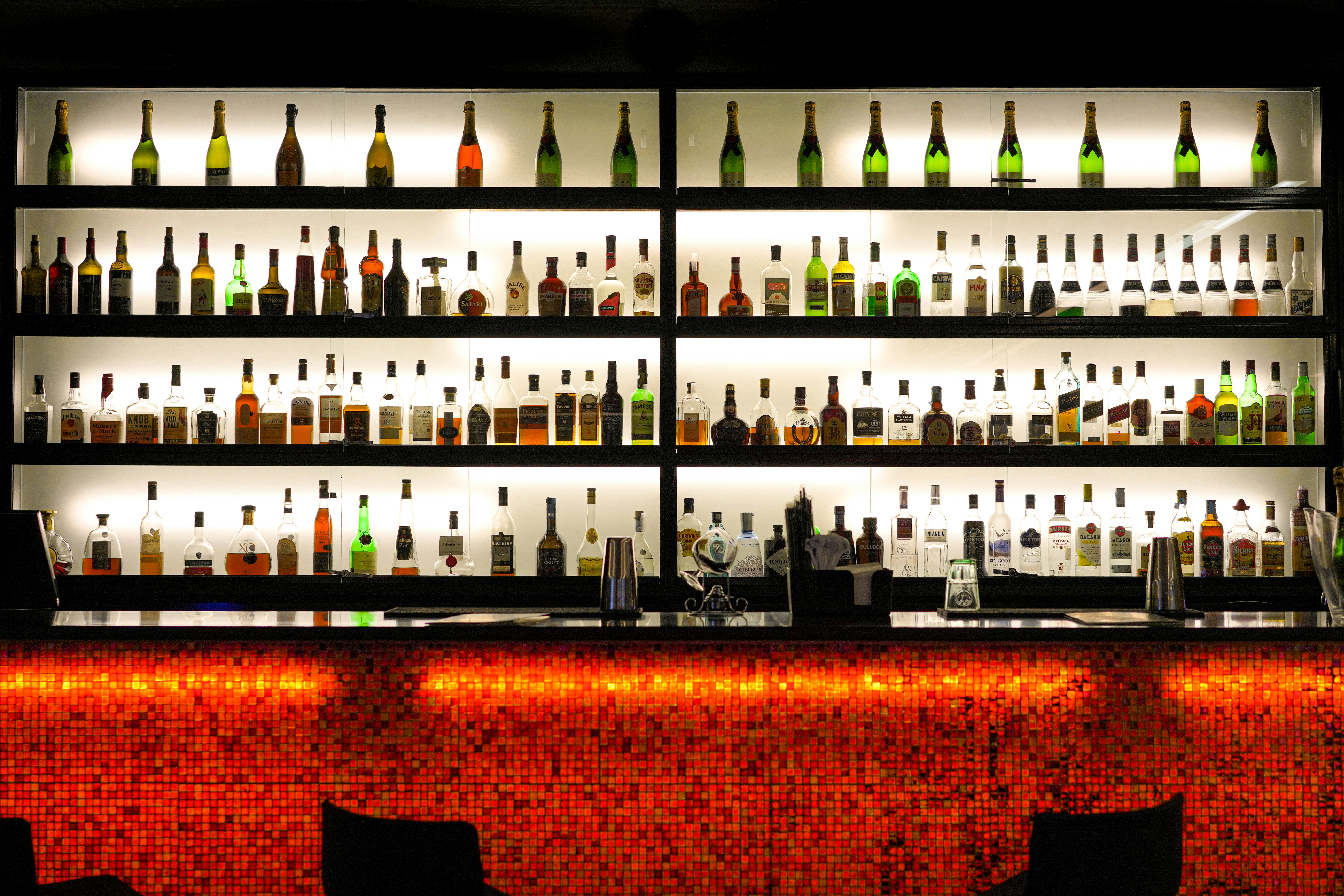 an interior of a fine dining restaurant with focused shot on the table with the plates and glass has been served