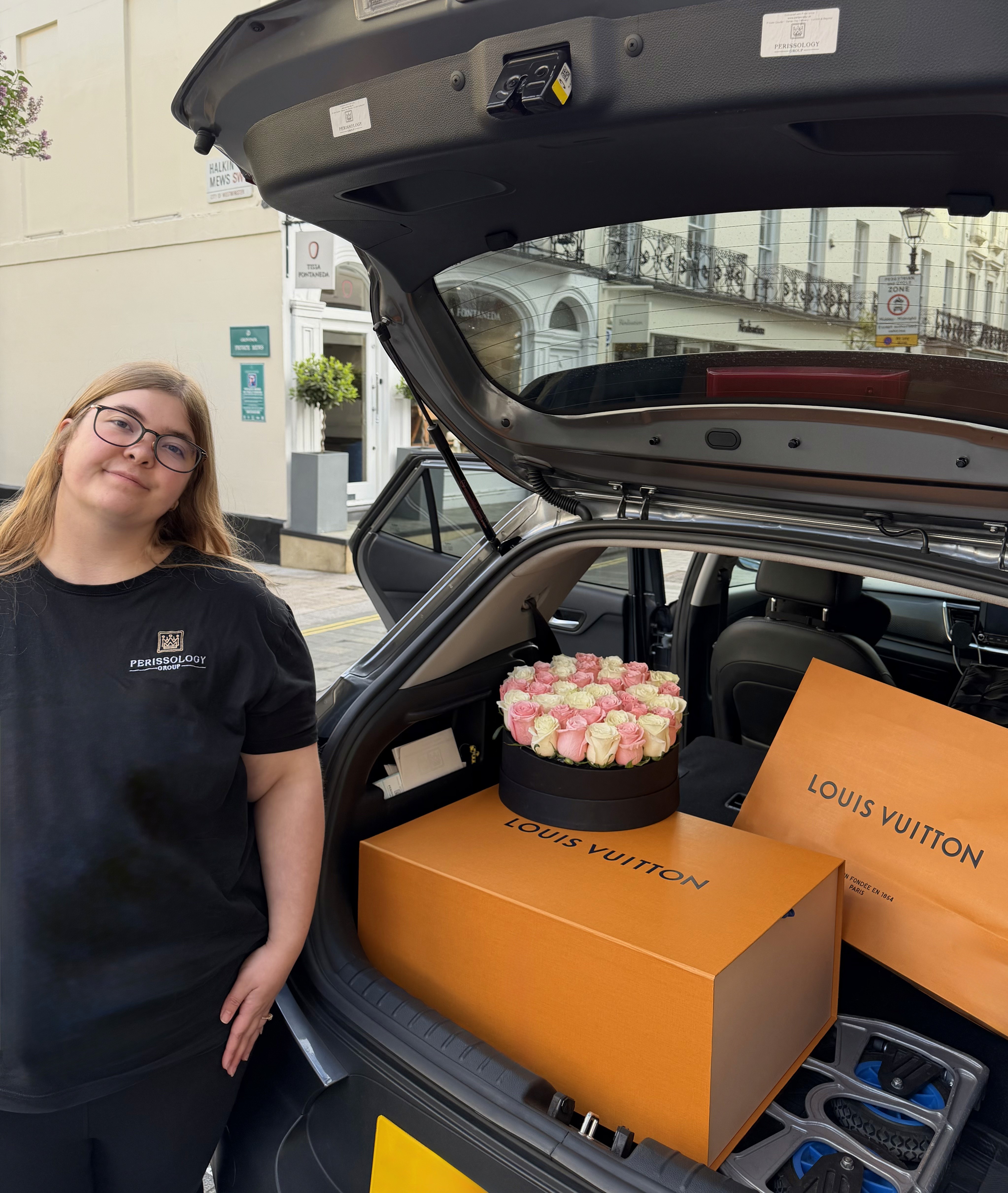 Perissology Courier delivering roses