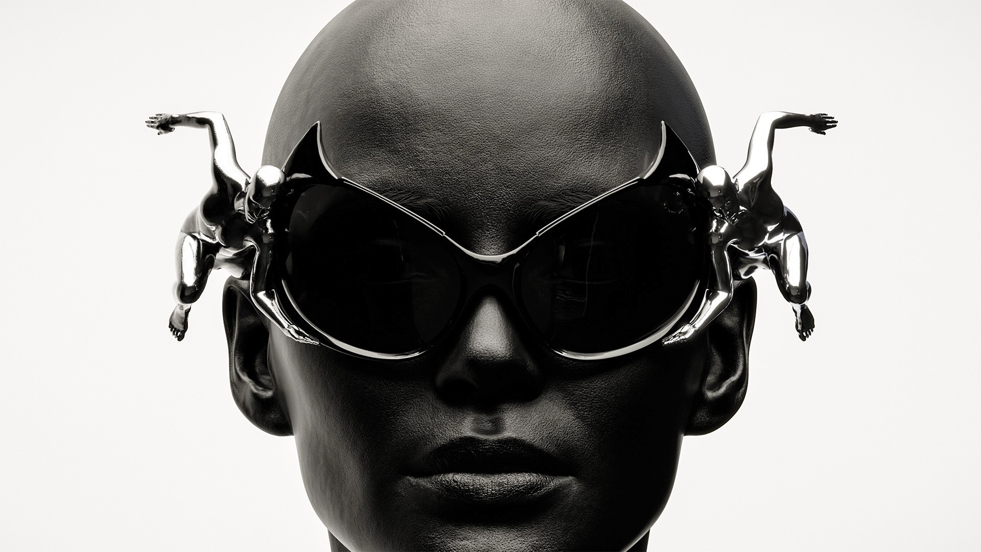 Female with dark skin wearing sunglasses with sterling silver accessoire, closeup