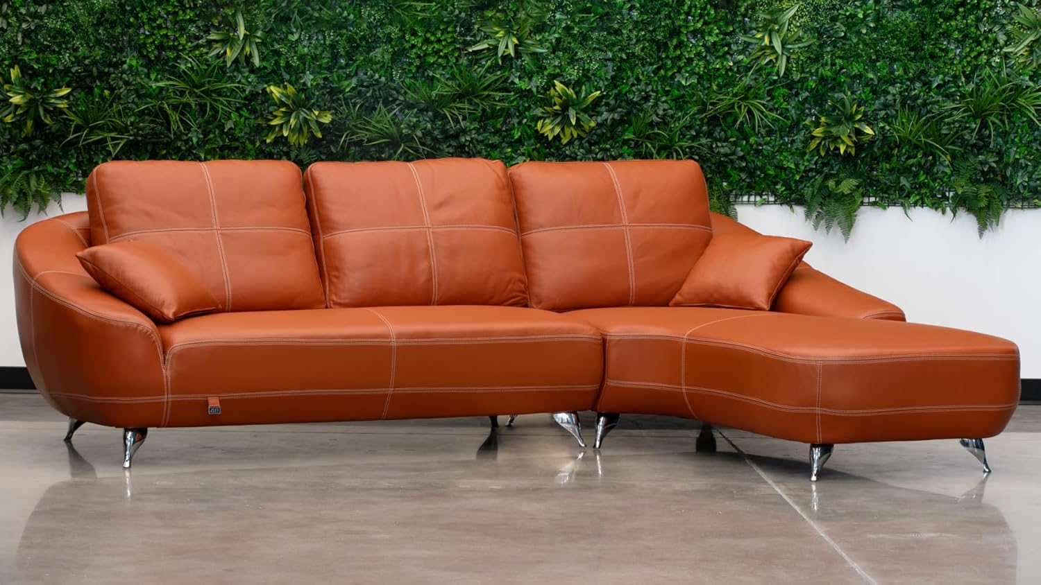 Comfortable orange leather sofa with soft upholstery and elegant lines, offering style and relaxation for your home.