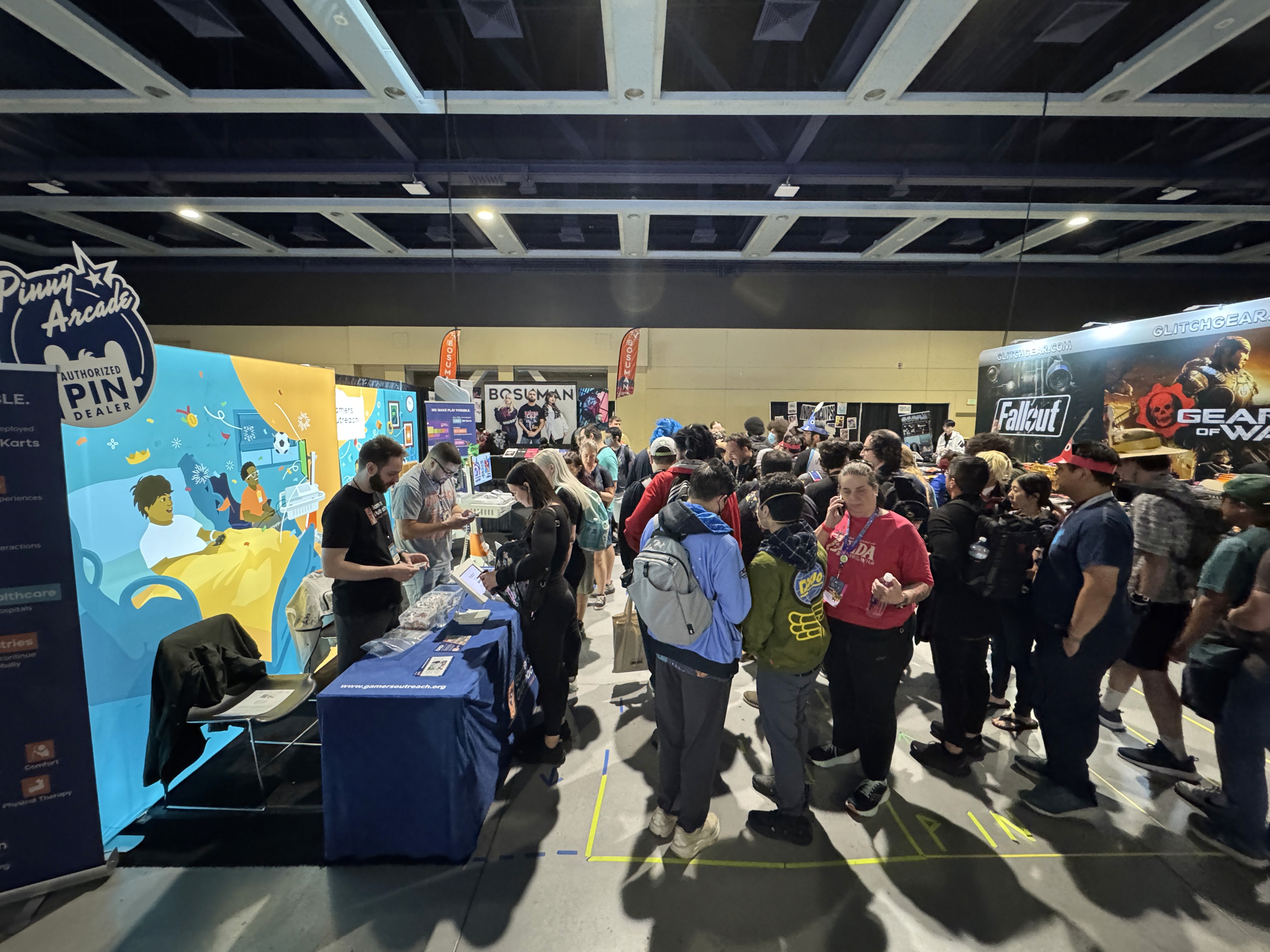 PAX West attendees line up at the Gamers Outreach booth