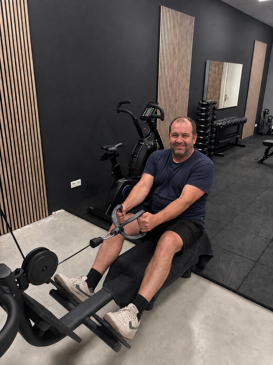 Top Second from Right: A man facing a gym mirror with another man in the reflection, preparing for a workout. Quote: “In just 10 weeks, I dropped 18 pounds…” – Nurse Practitioner.