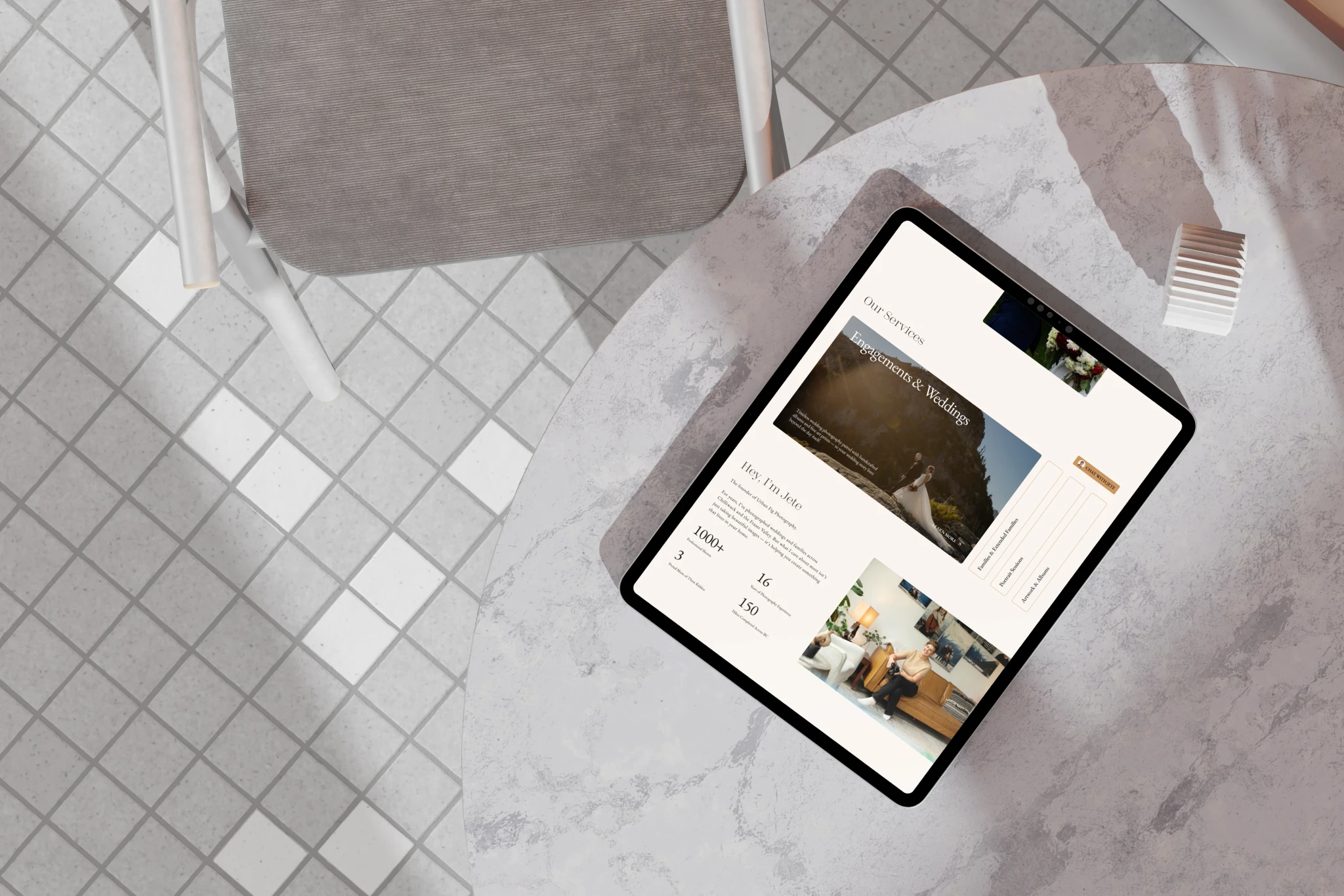 Tablet on a marble table showing an Urban Fig Photography page