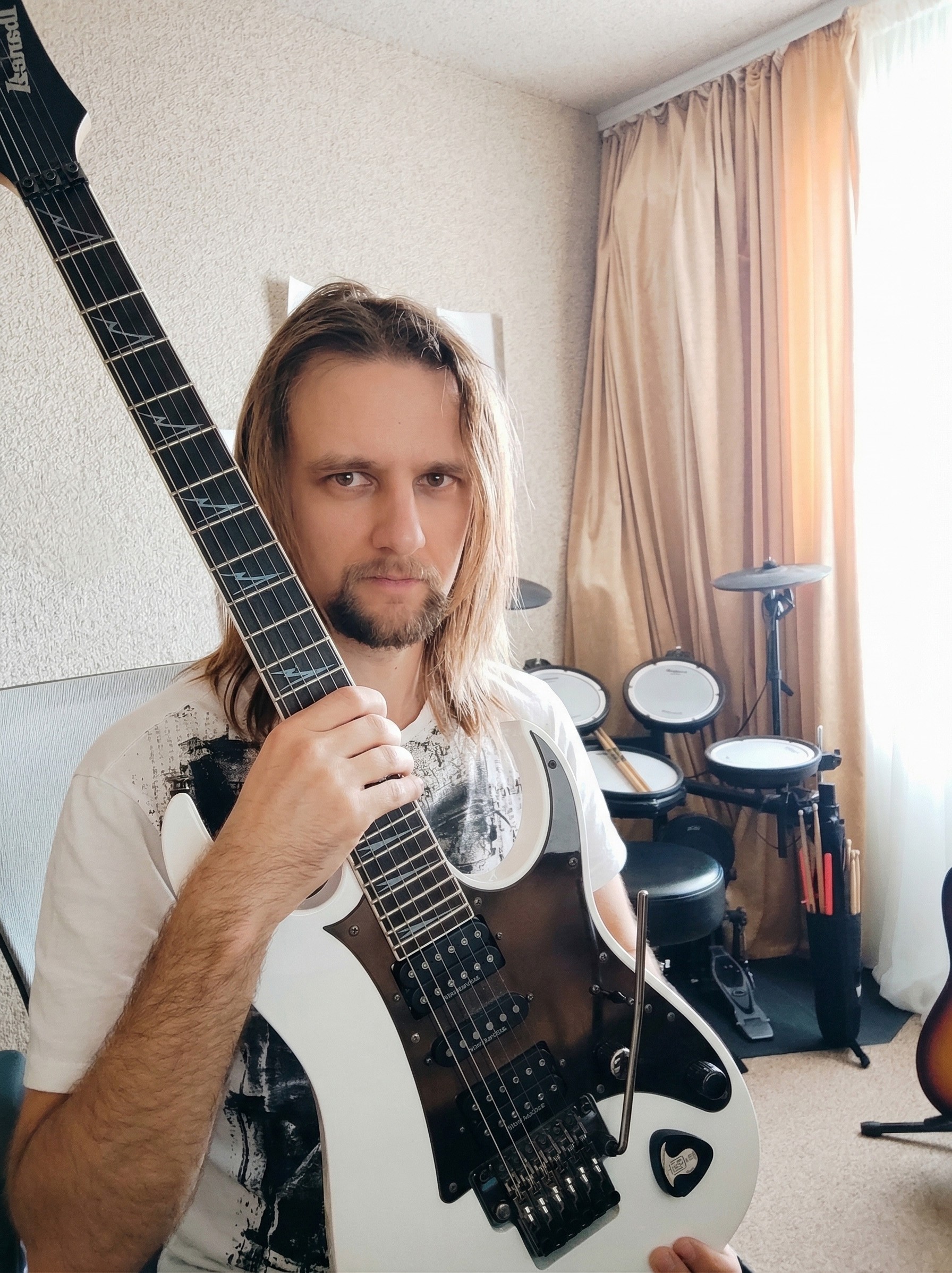 Music producer sitting in his studio