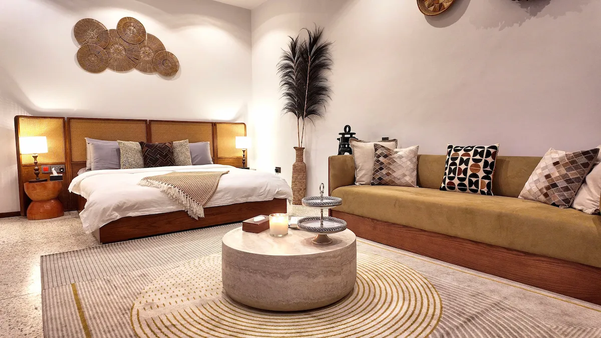 wide shot of bed and couch