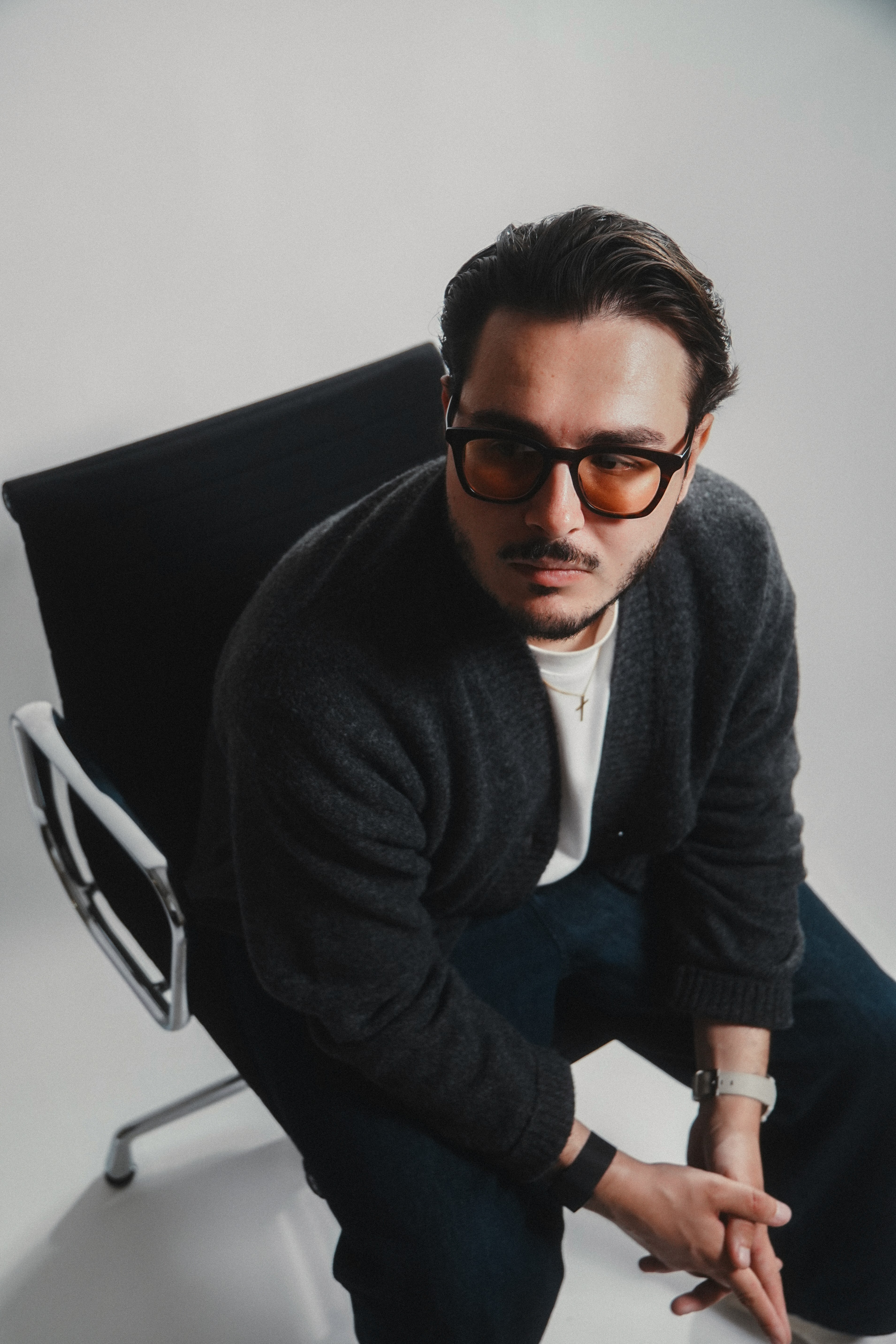 a blurry photo of a person standing in front of a wall