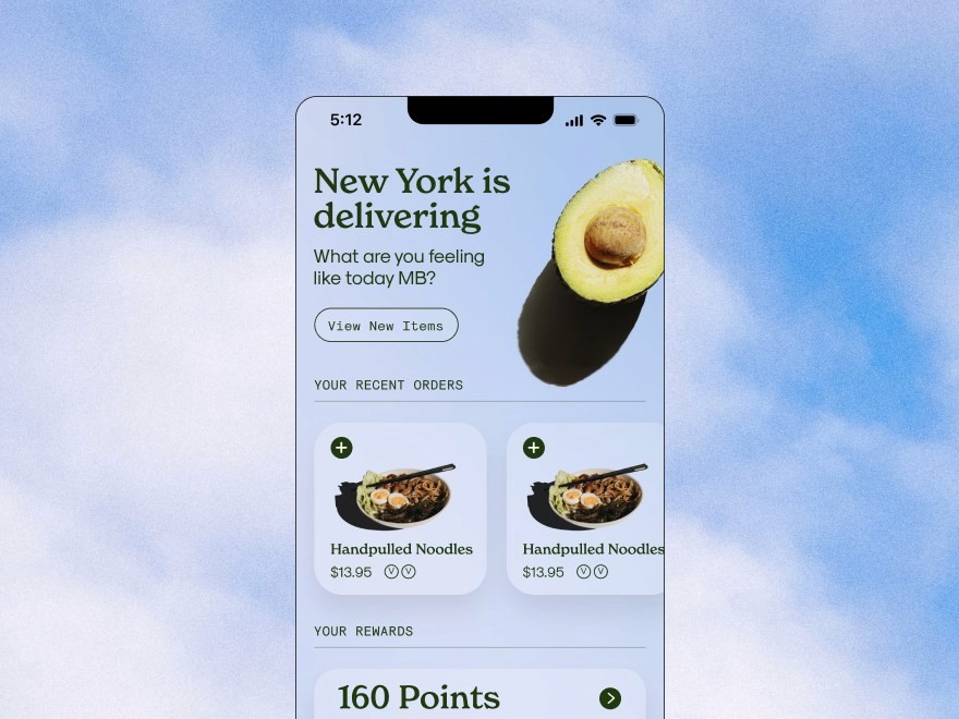 Restaurant App phone mockupwith avocado and ordering information against blue sky and clouds
