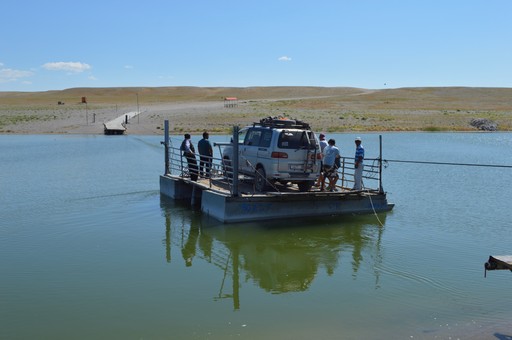Car crossing the water in Mongolia