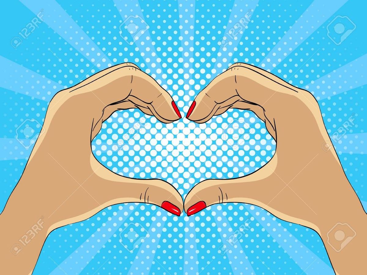 A woman smiling at the camera in a cafe