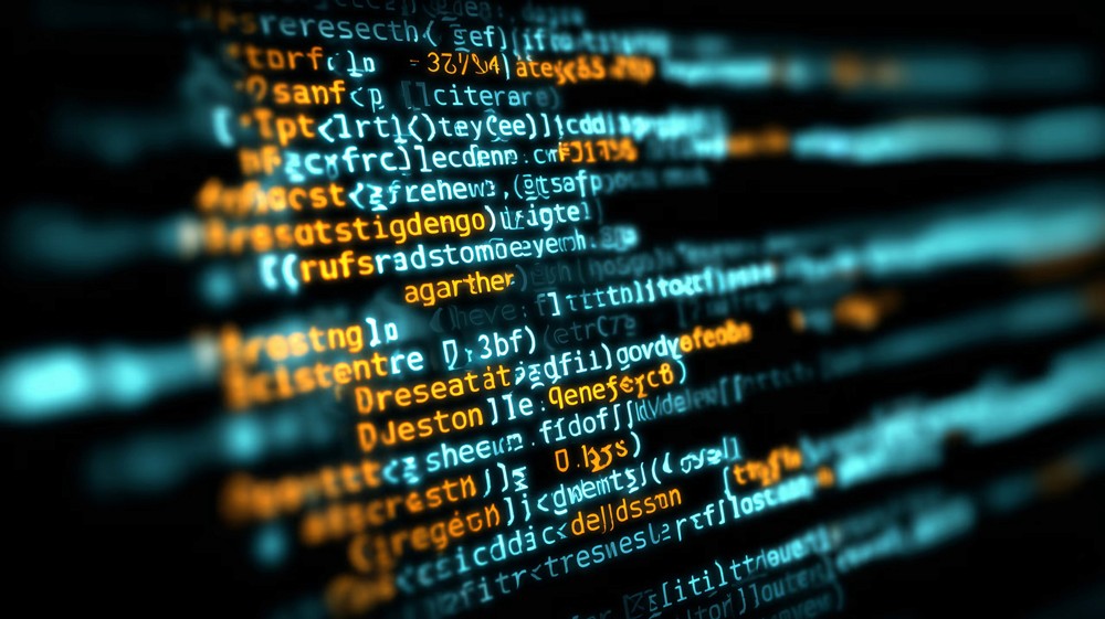 Red digital warning symbol glowing on a circuit board interface, representing active ransomware exploitation of the VMware ESXi CVE 2025 22225 vulnerability and hypervisor compromise.