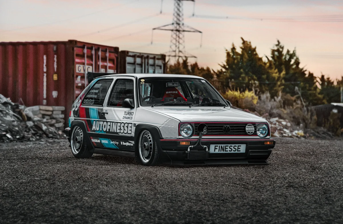 Streetside billboard with flyposters of the Batch.Works brand and illustrations