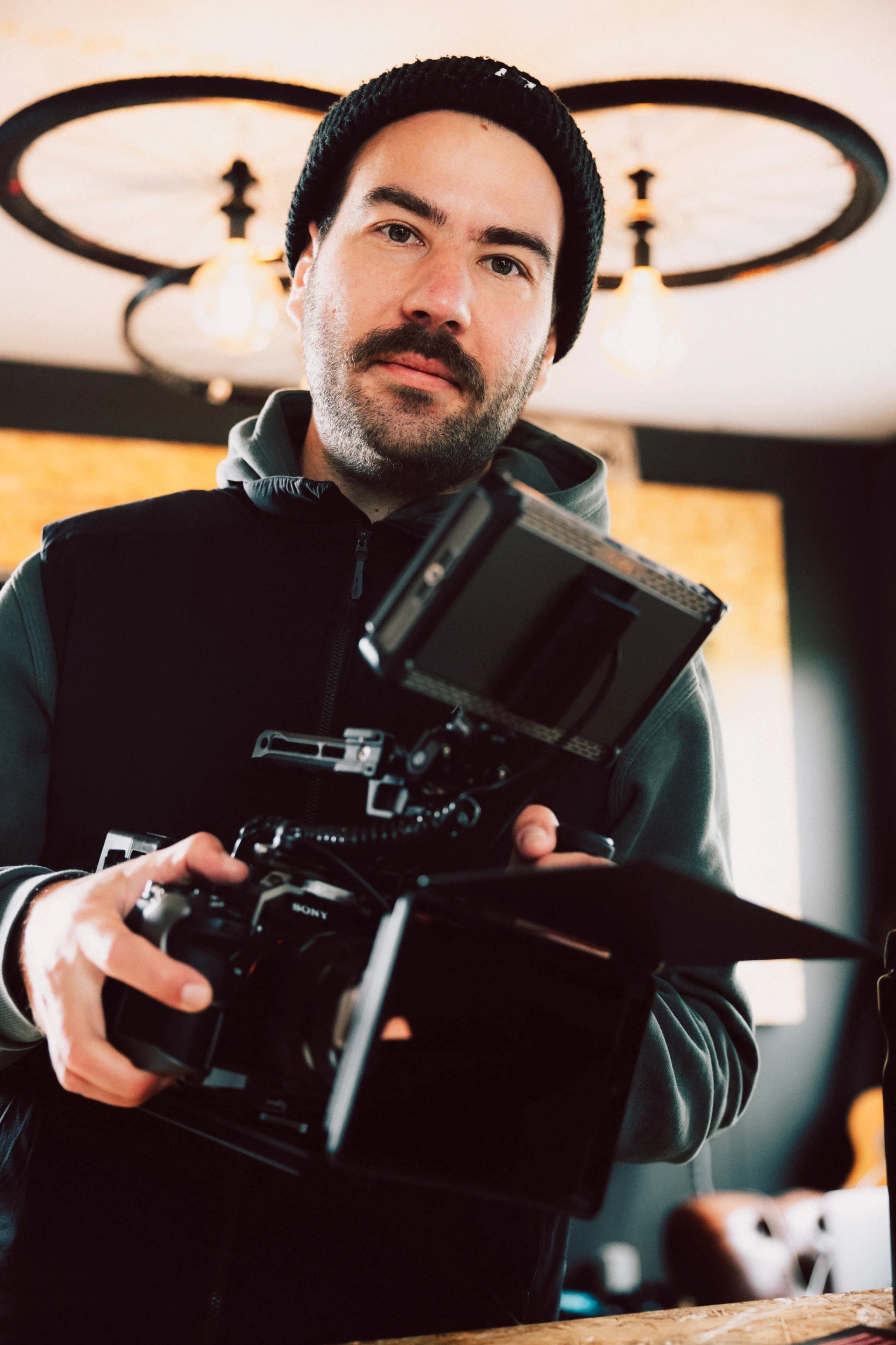 Man preparing camera for a MTB photo shoot in Iceland