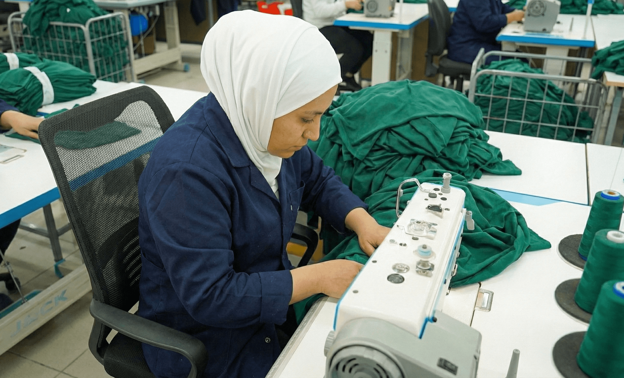 employee who works on the knitting machine.