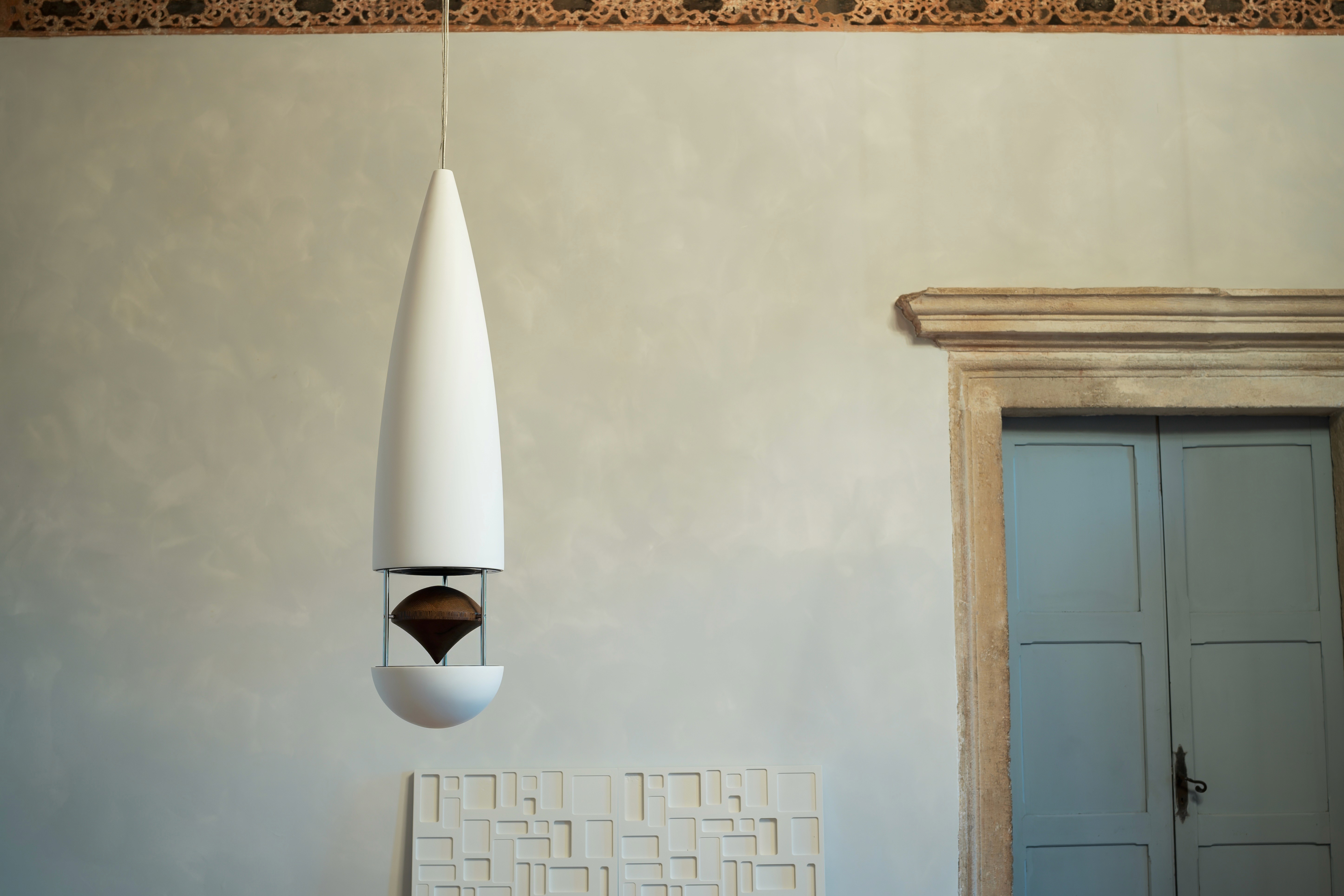 Streetside billboard with flyposters of the Batch.Works brand and illustrations