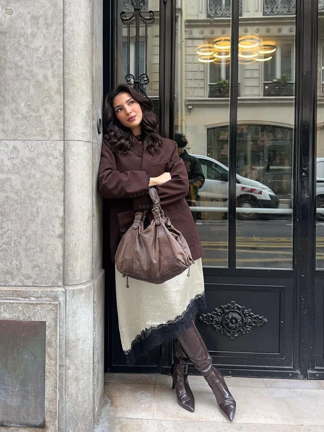 woman on the front of a building entrance