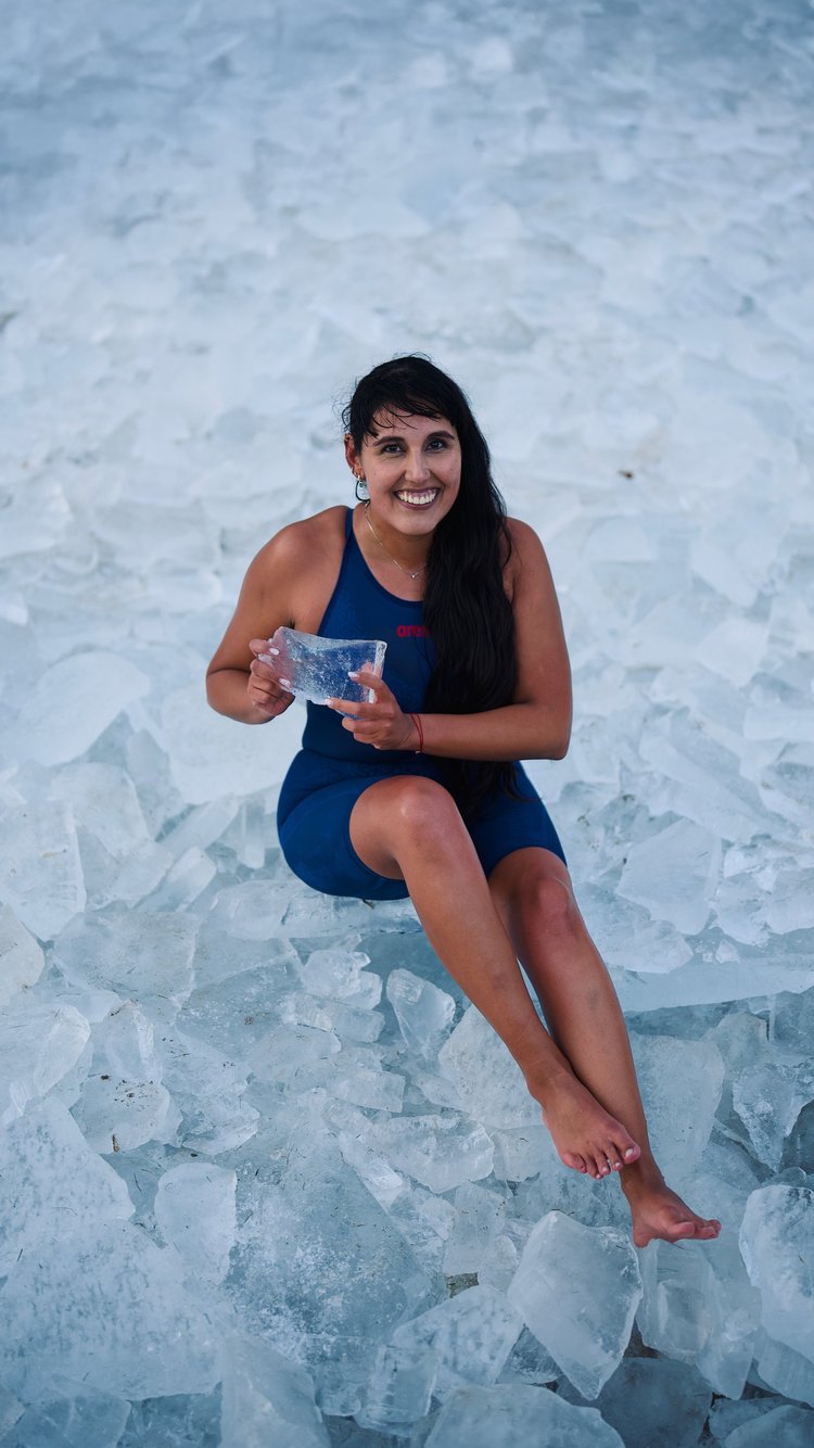 An image of athletes training in freezing conditions, highlighting the rigorous preparation involved in ice swimming.