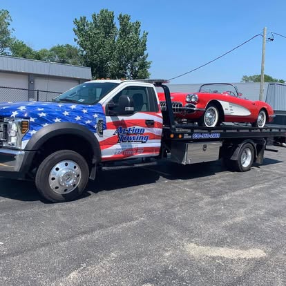 a person sitting in front of a computer screen