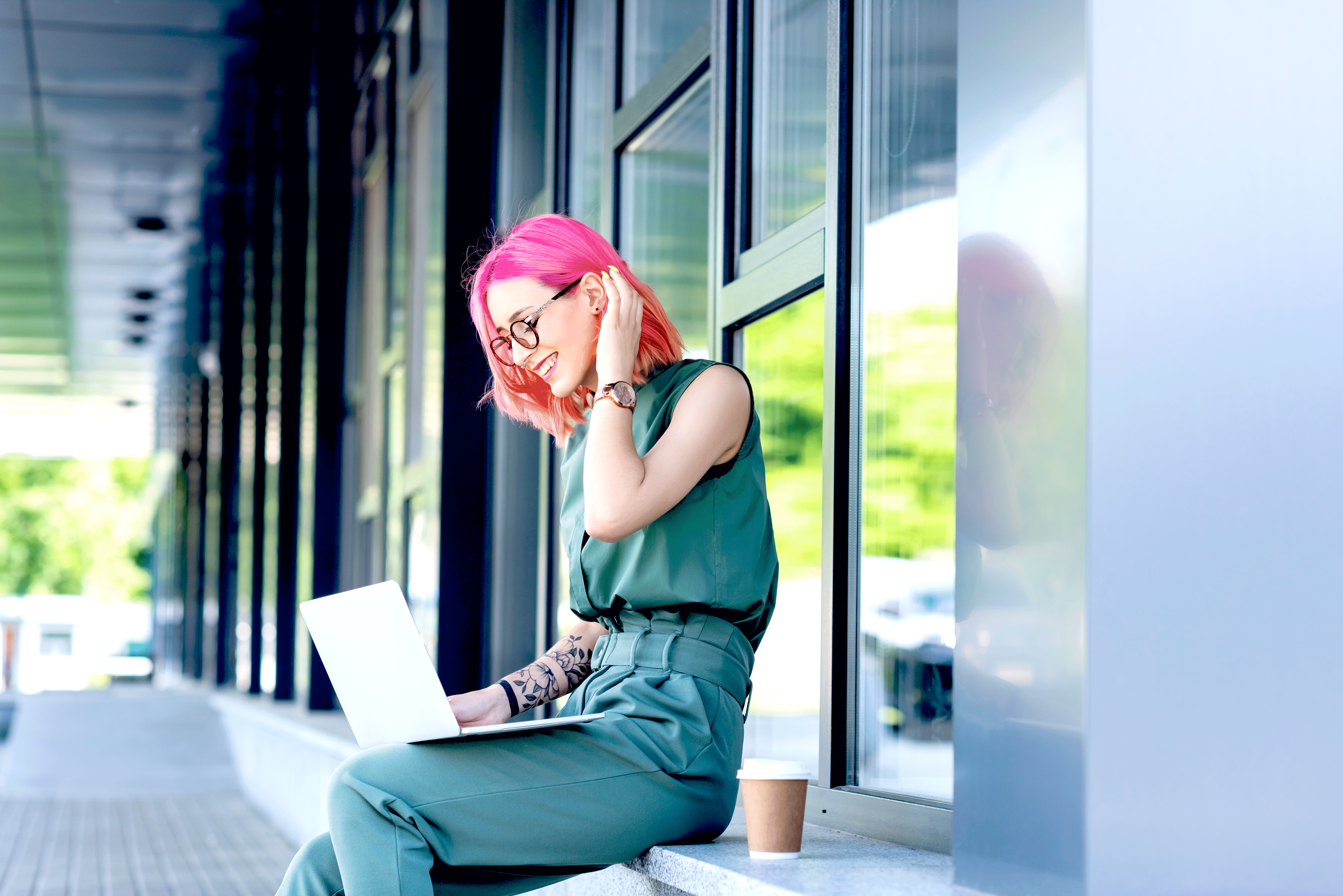 woman pink hair virtual interview