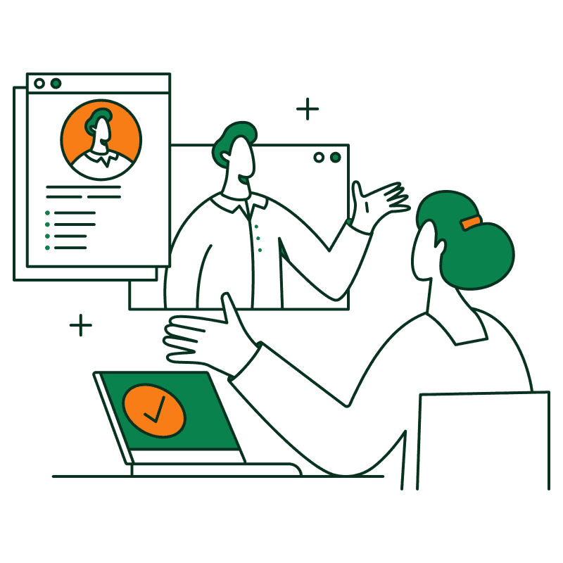 Two people working at desks in a bright, plant-filled office.