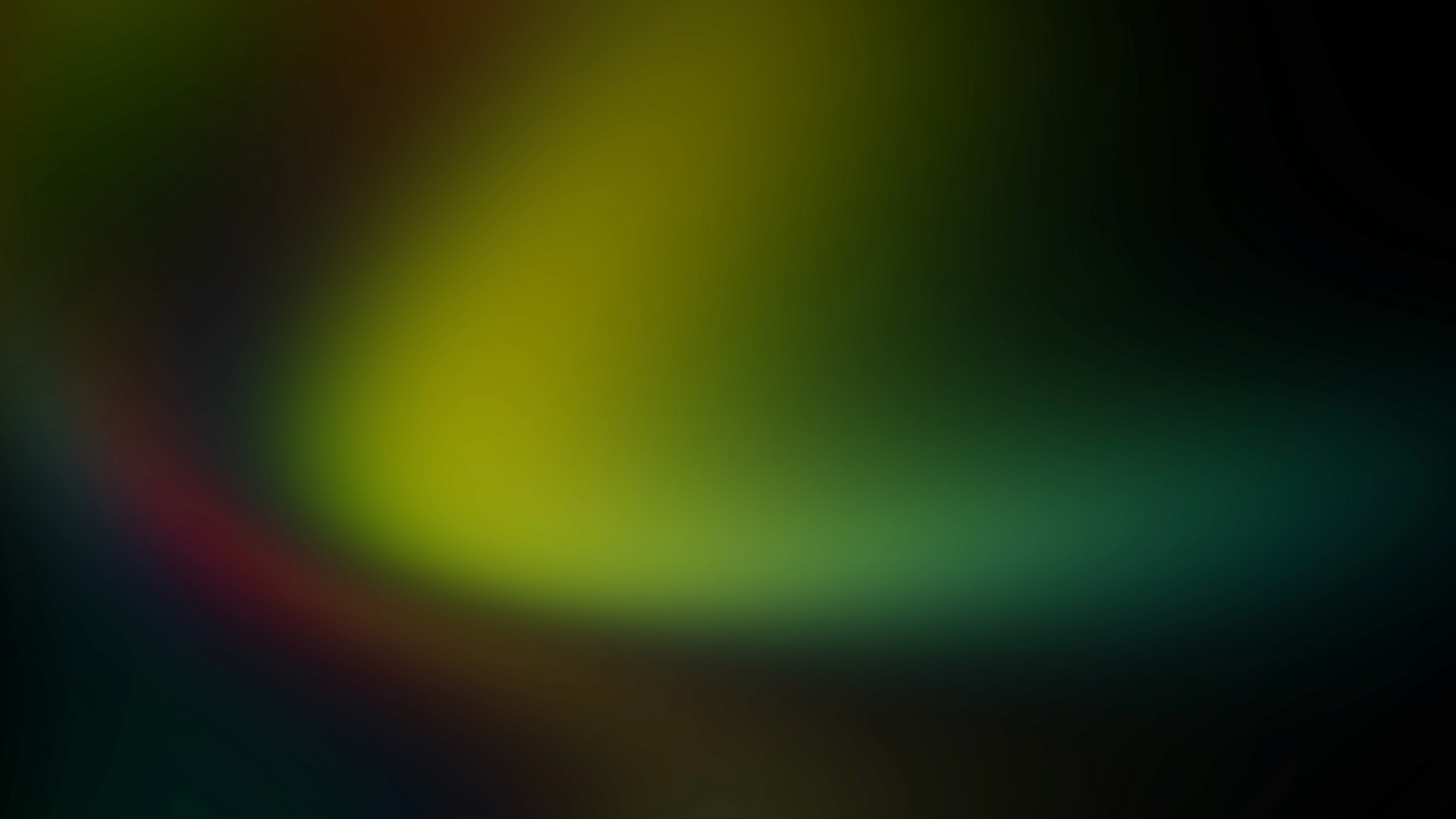 Abstract dark gradient background with green and yellow highlights