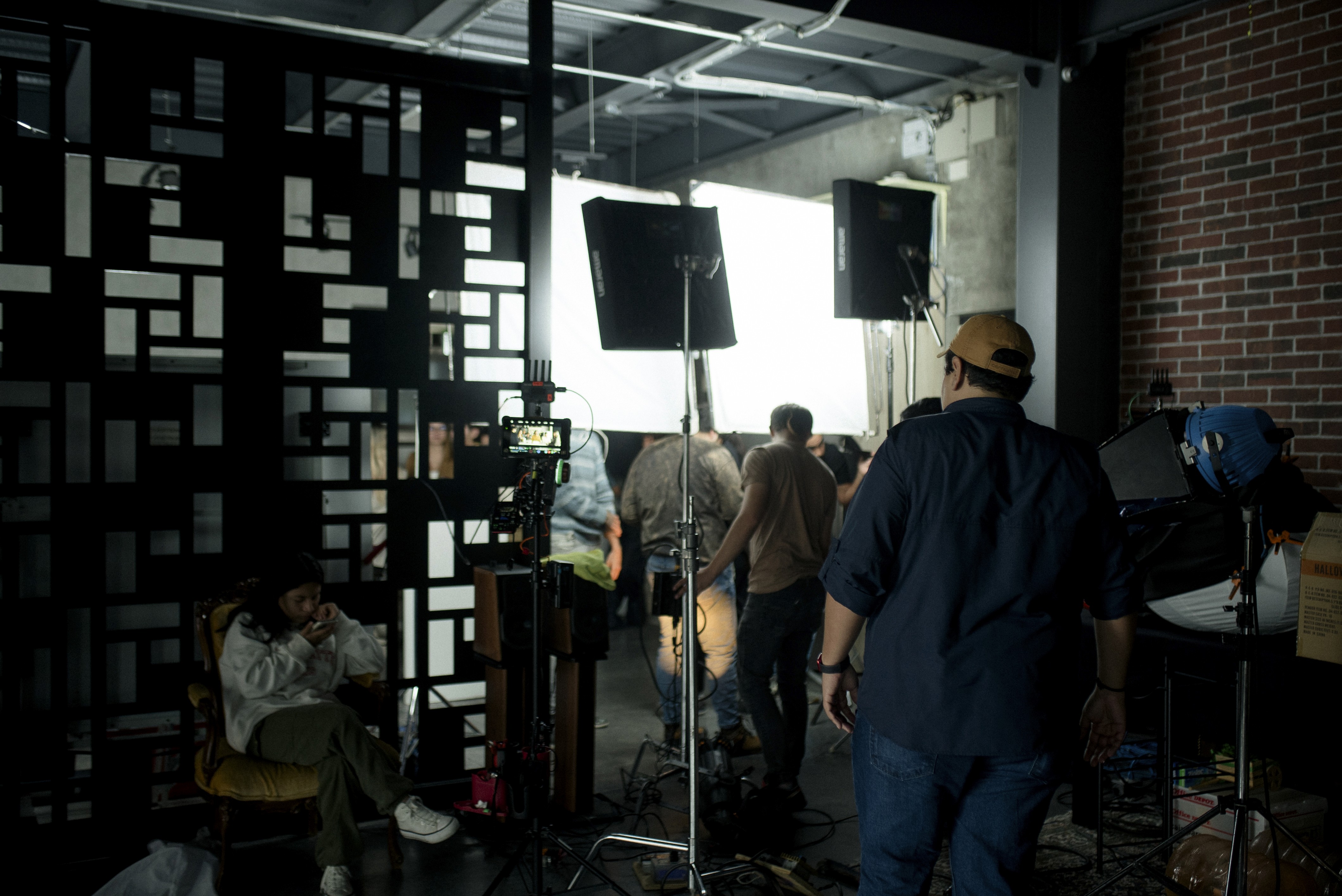 The collaborative production team of Antimateria Films on set for a global Warner Music project, highlighting film production services.