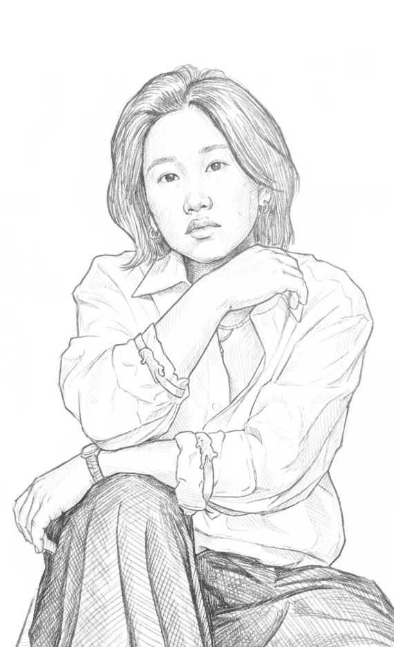 Portrait of a person in a pink sweater against a light background