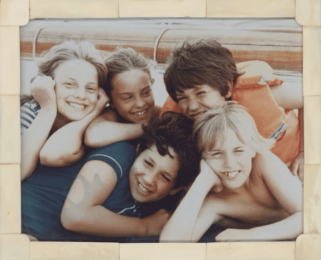 Vintage photo of the young cousins smiling together
