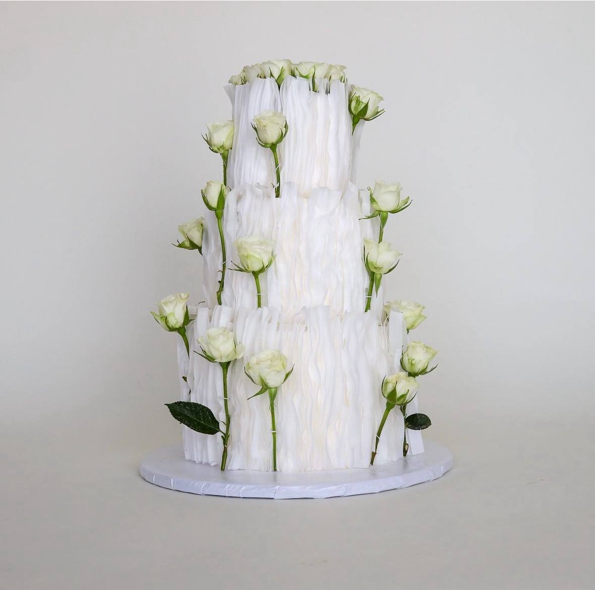 3 tier floral wedding cake with live flowers