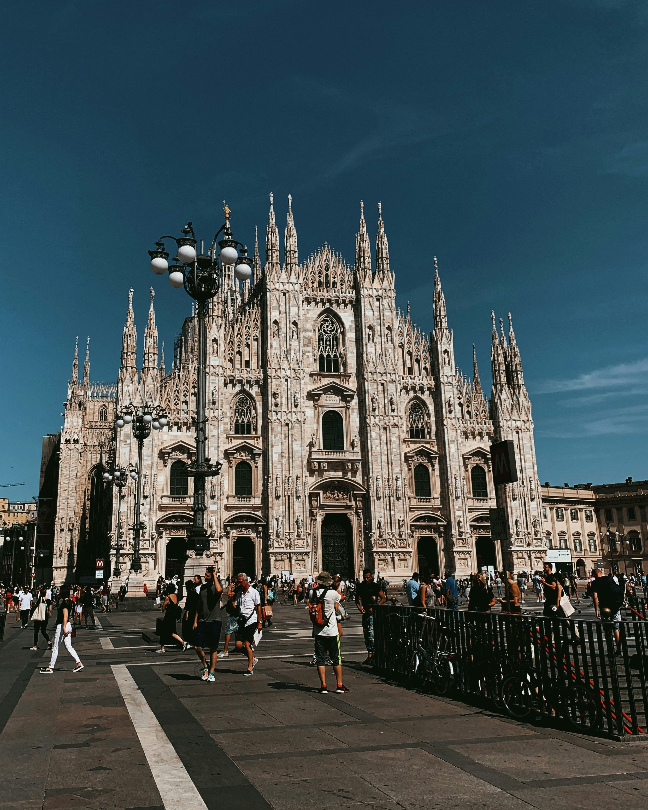 group of people surrounded cathedral during daytime