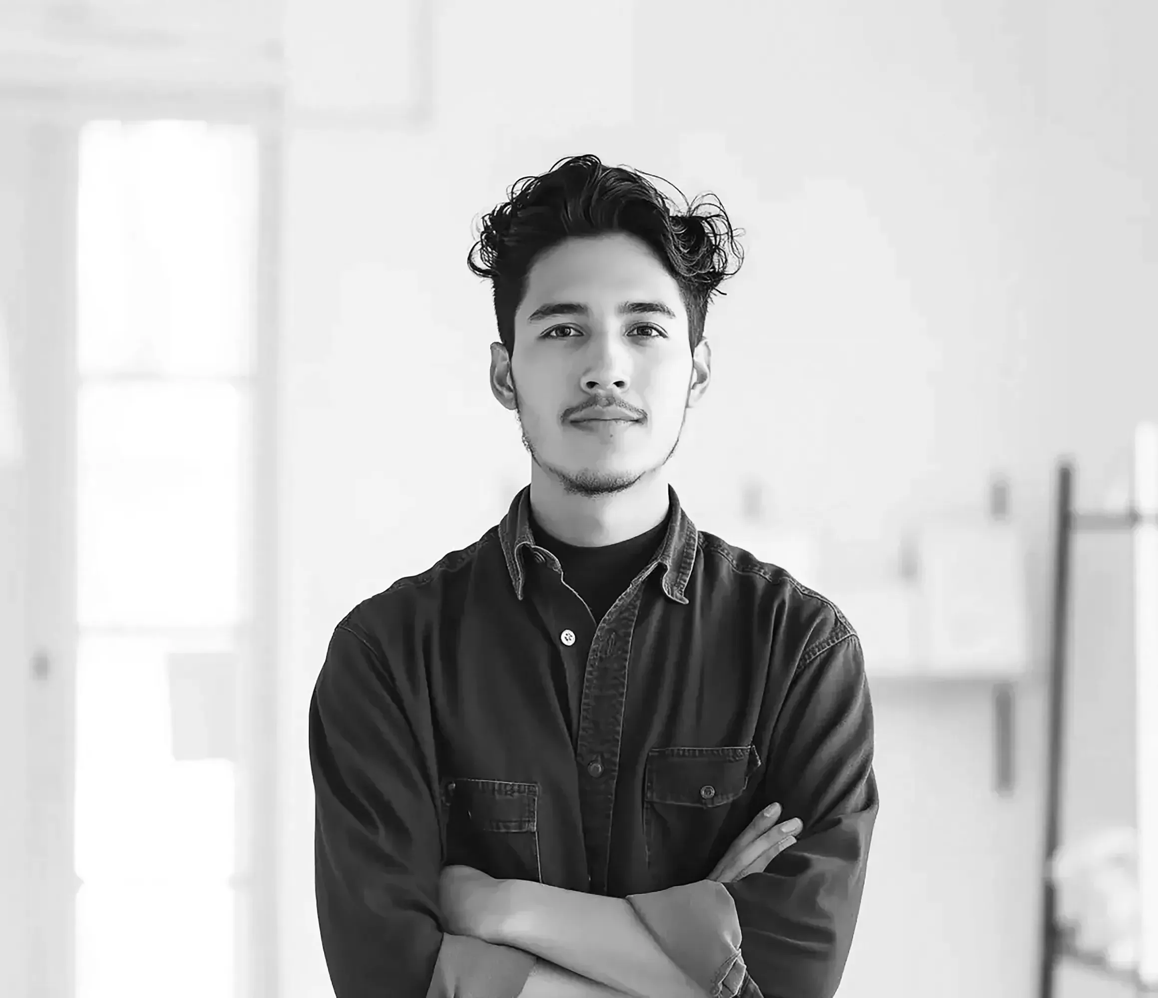 Confident Young Man in Interior