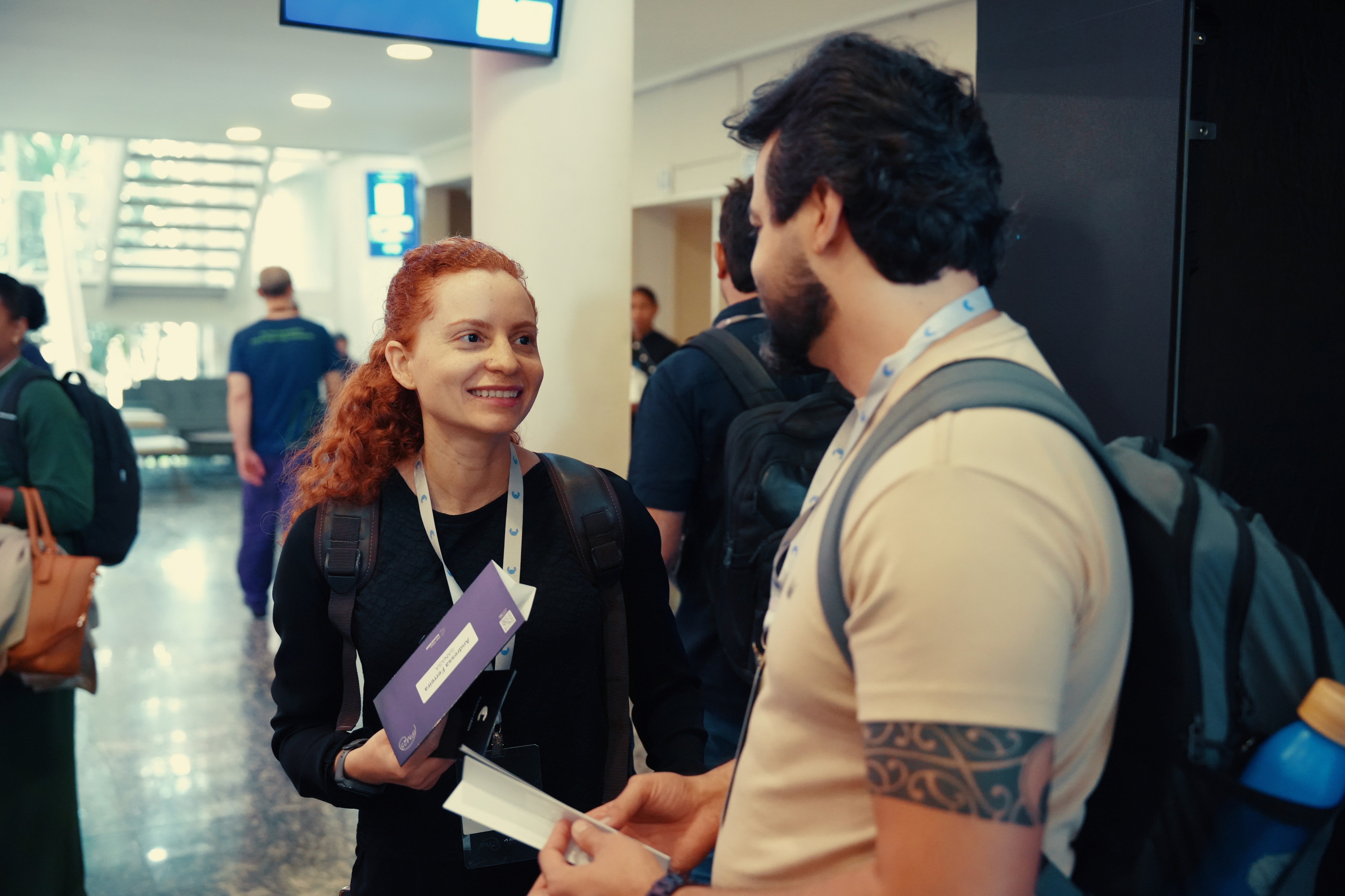 Imagem de pessoas conversando no evento IPM