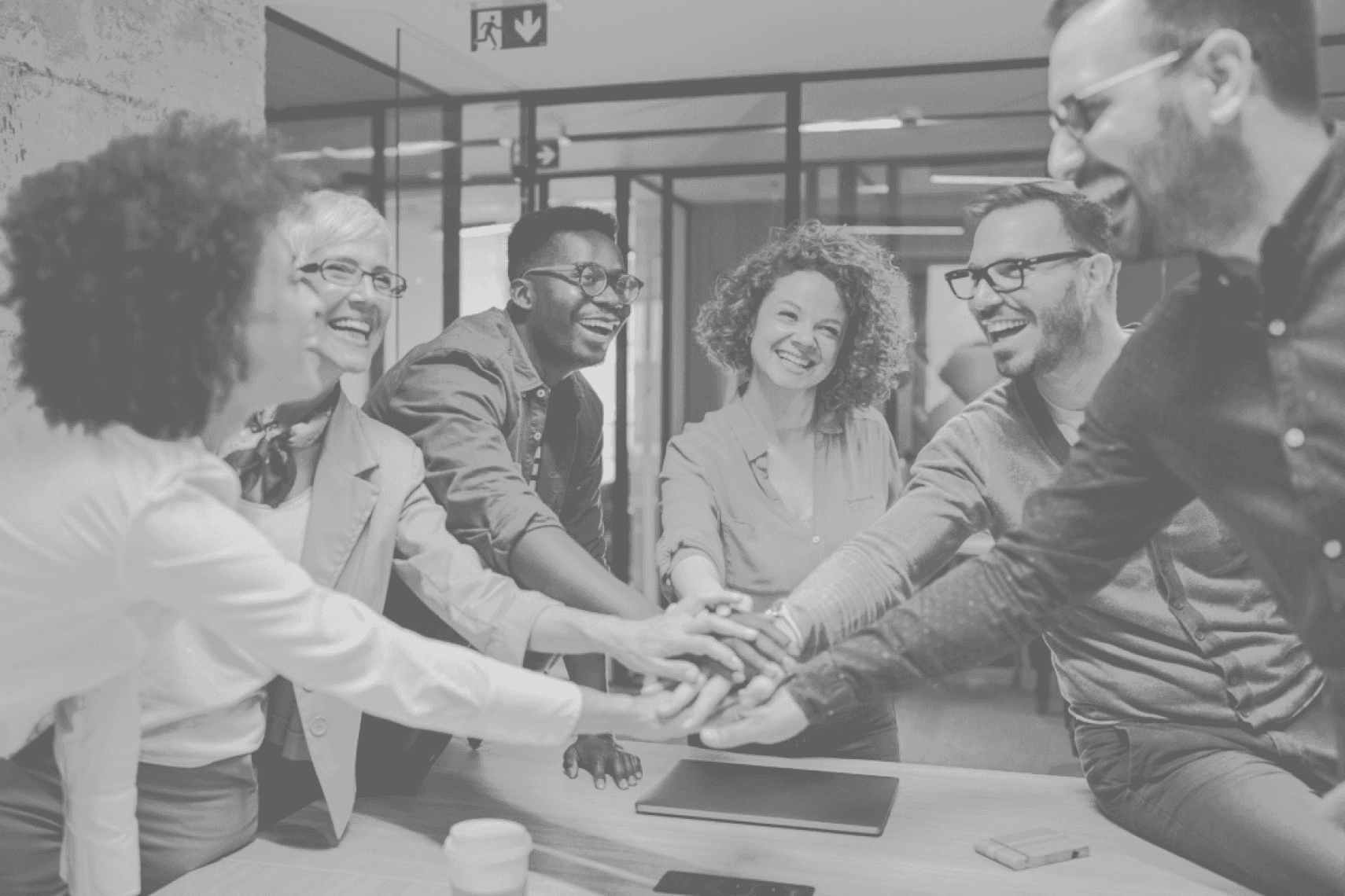 Happy image of group members in a office room