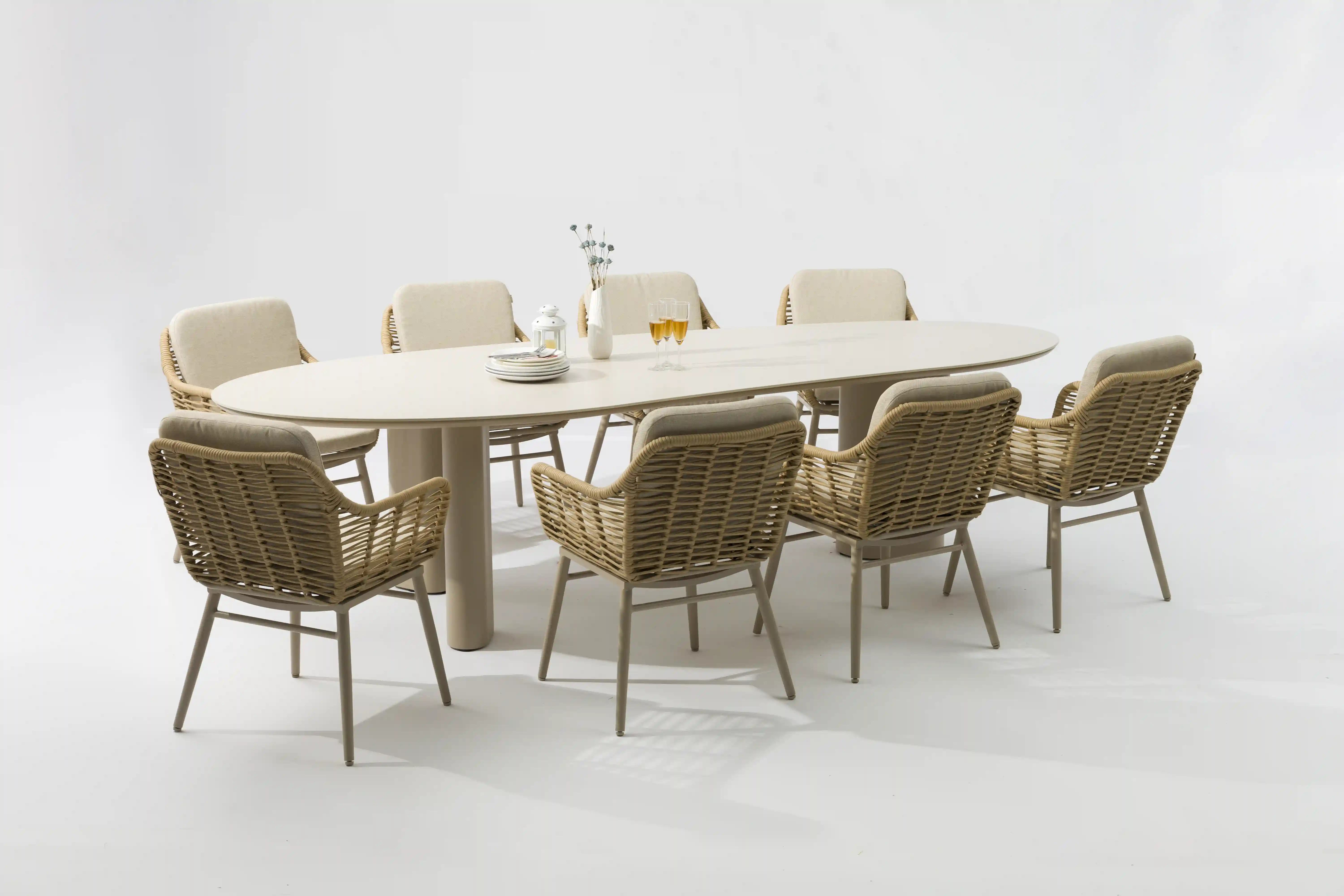 Elegant Antoni COCO garden furniture set featuring a spacious oval table and comfortable chairs for outdoor dining.