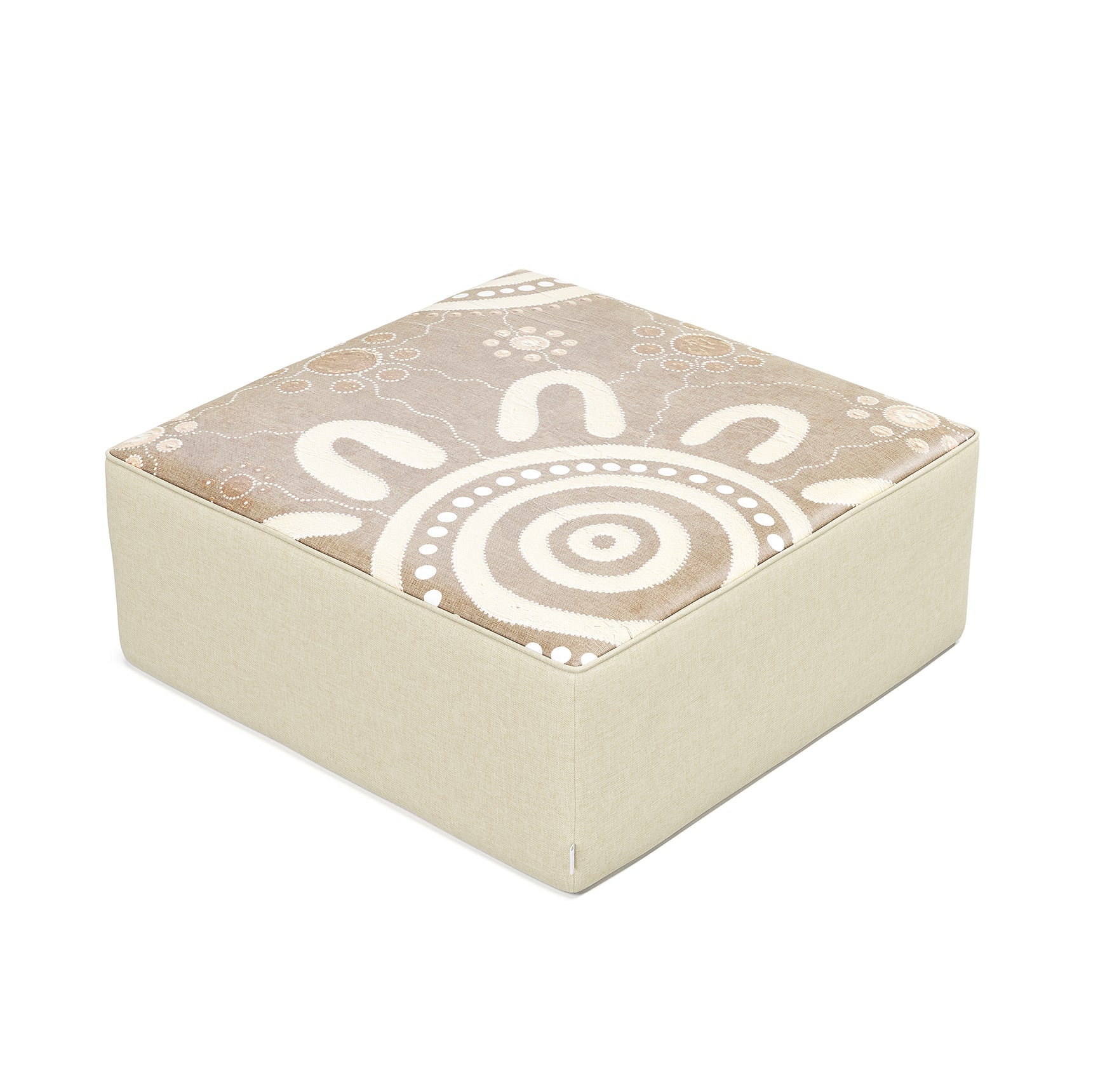 Square floor cushion with patterned fabric top and soft upholstered base