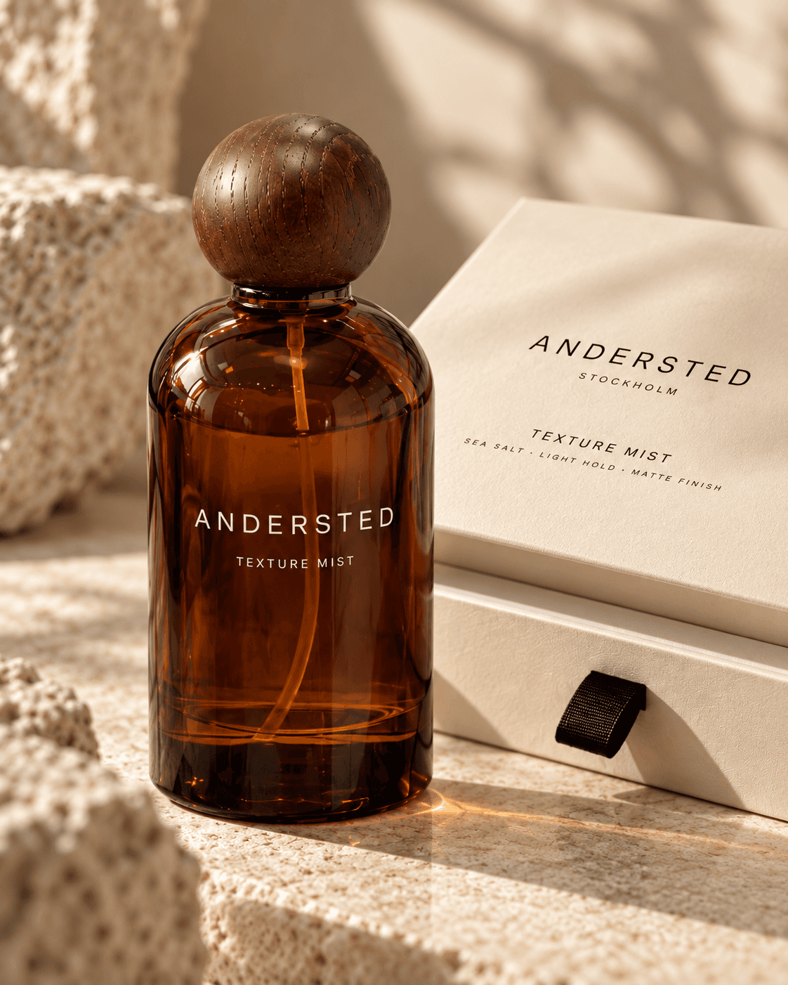 Andersted Texture Mist i glasflaska intill sin förpackning