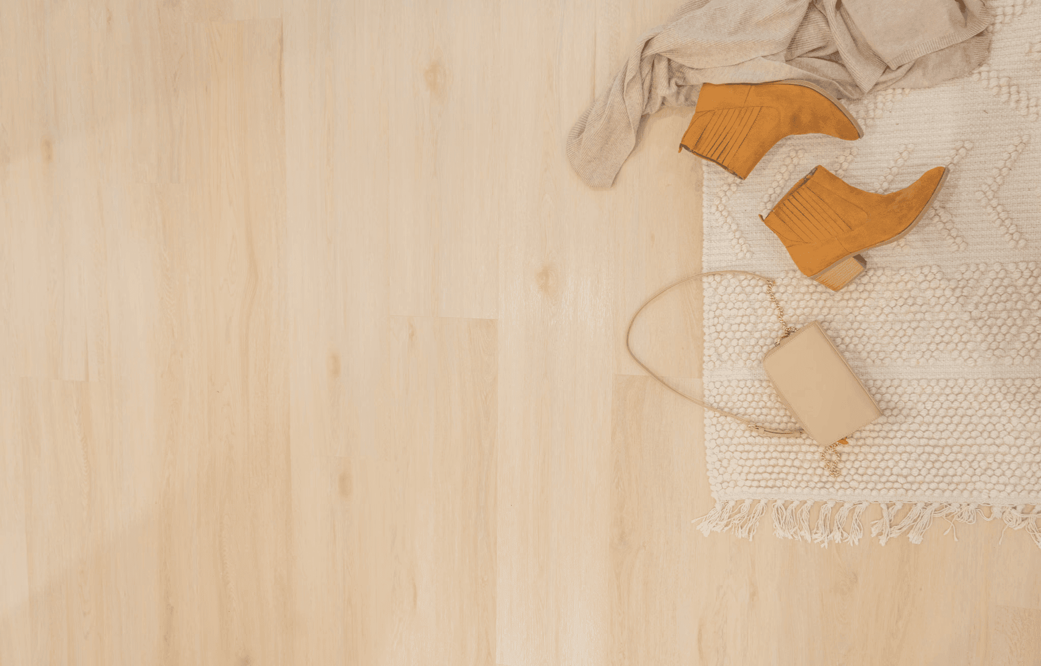 people walking on the beach in front of a city