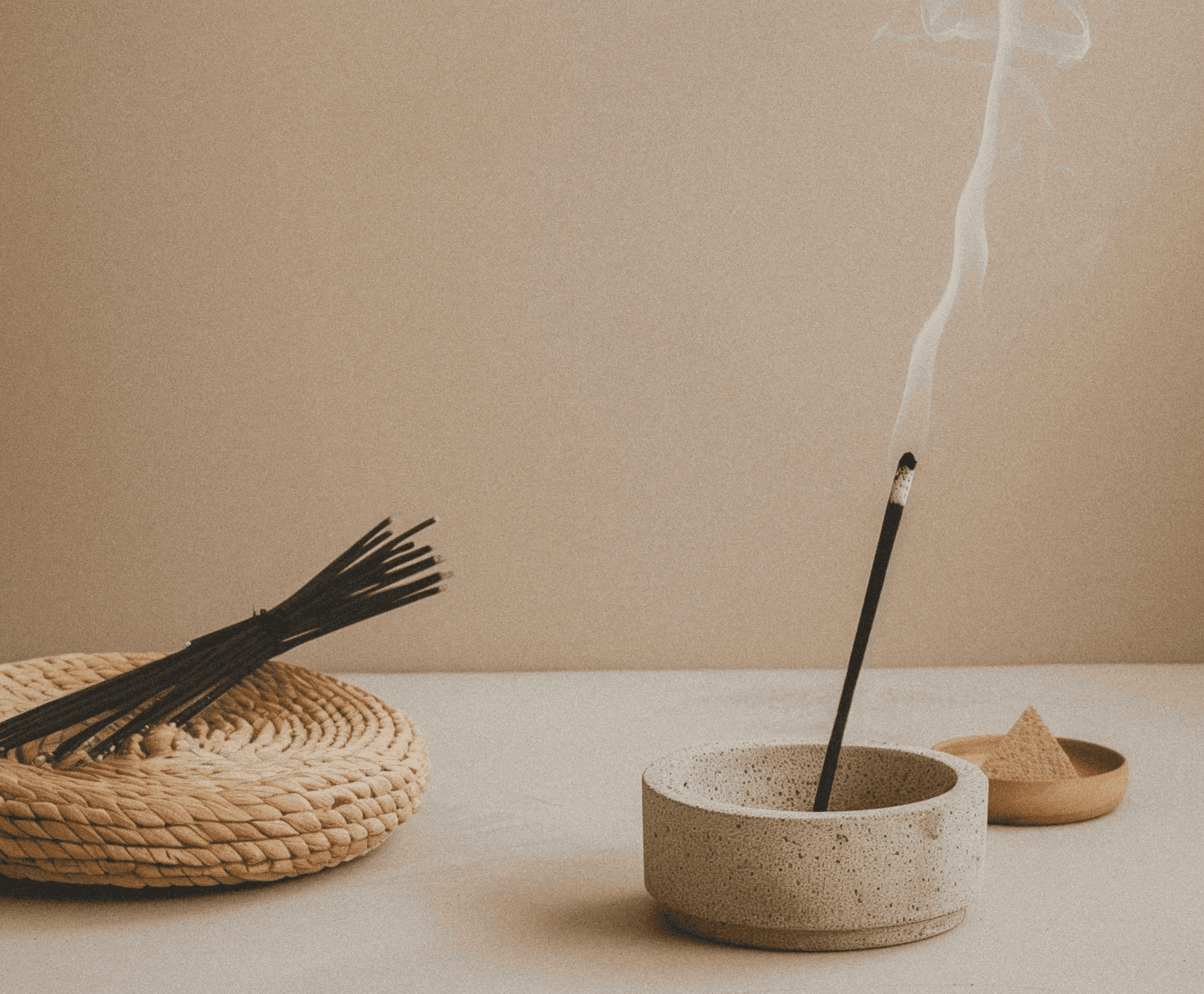 A woman with short hair, eyes closed, exuding a sense of calm and serenity.