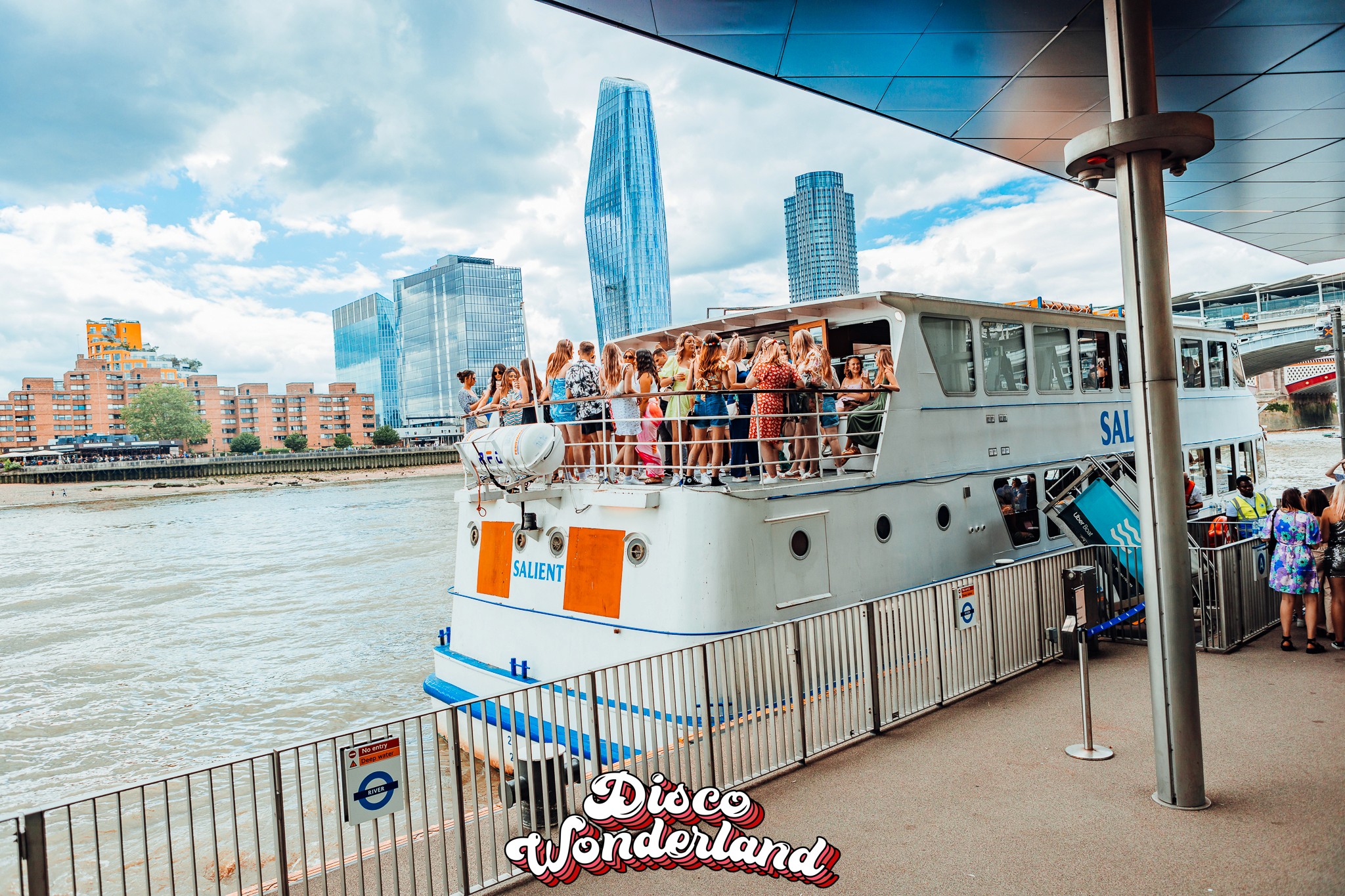 The Dutch Master charter boat on the River Thames with the London skyline and The Shard behind it