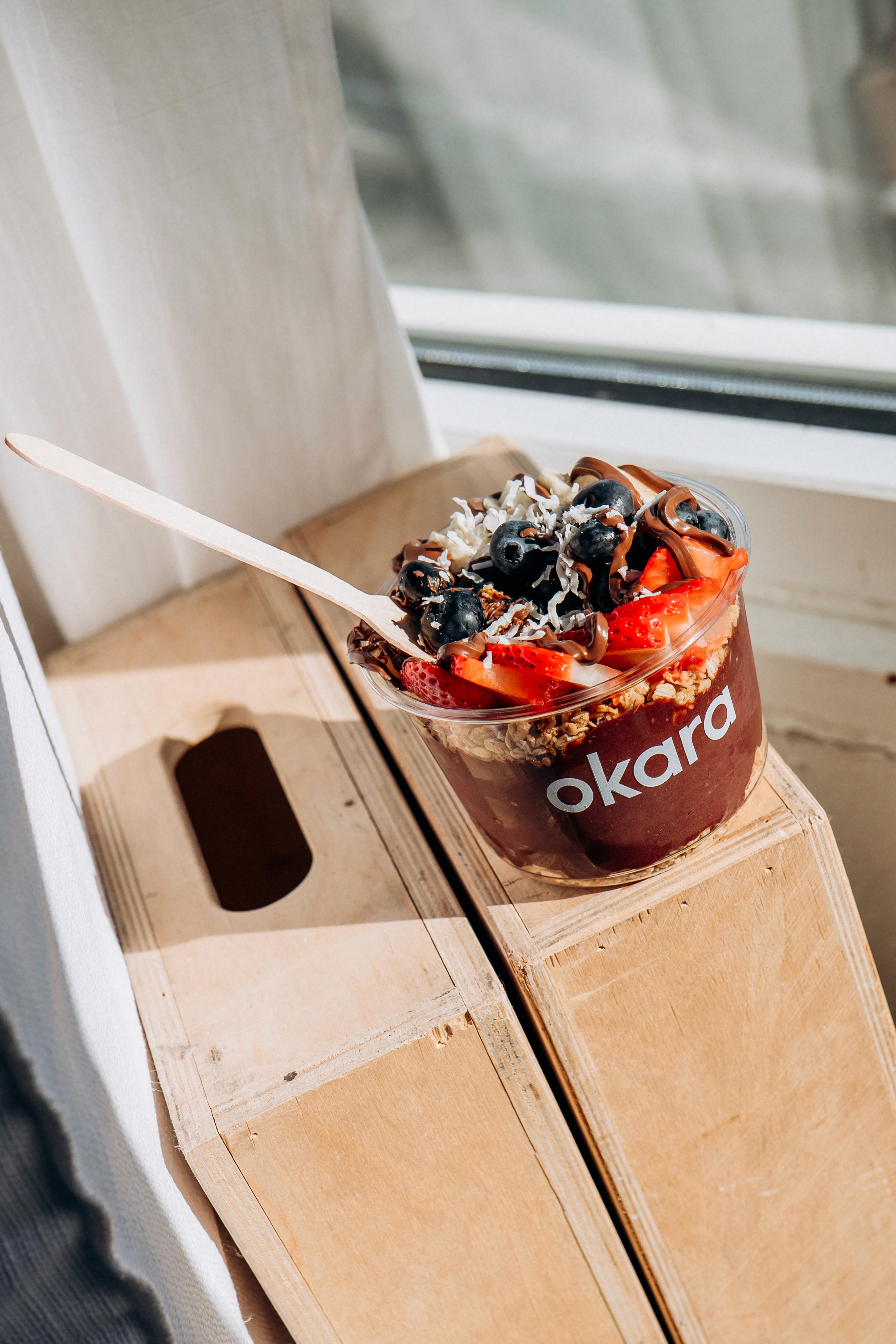 person writing on a piece of paper