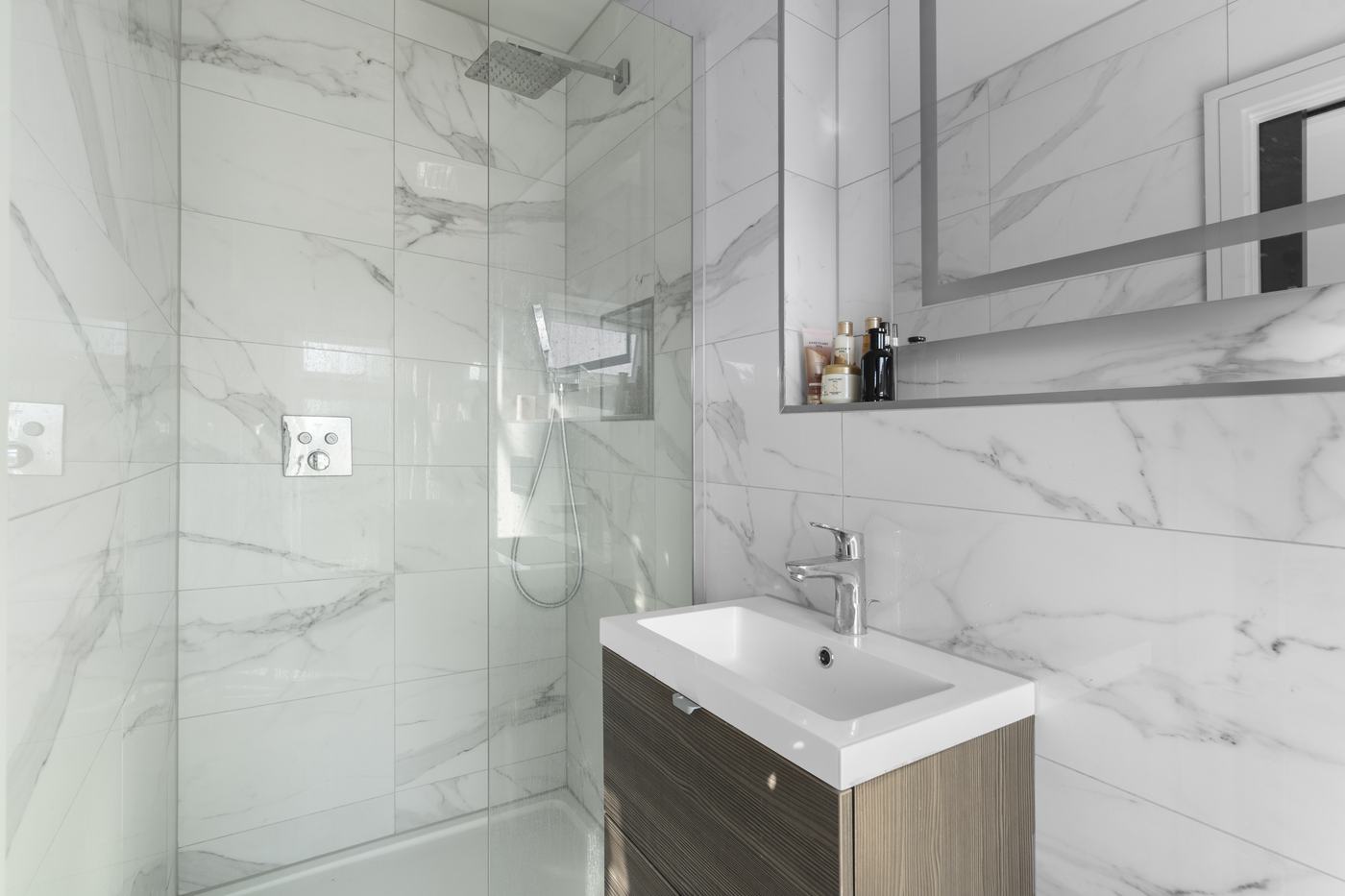 Marble-tiled bathroom with walk-in shower and vanity unit, High Barnet Airbnb property