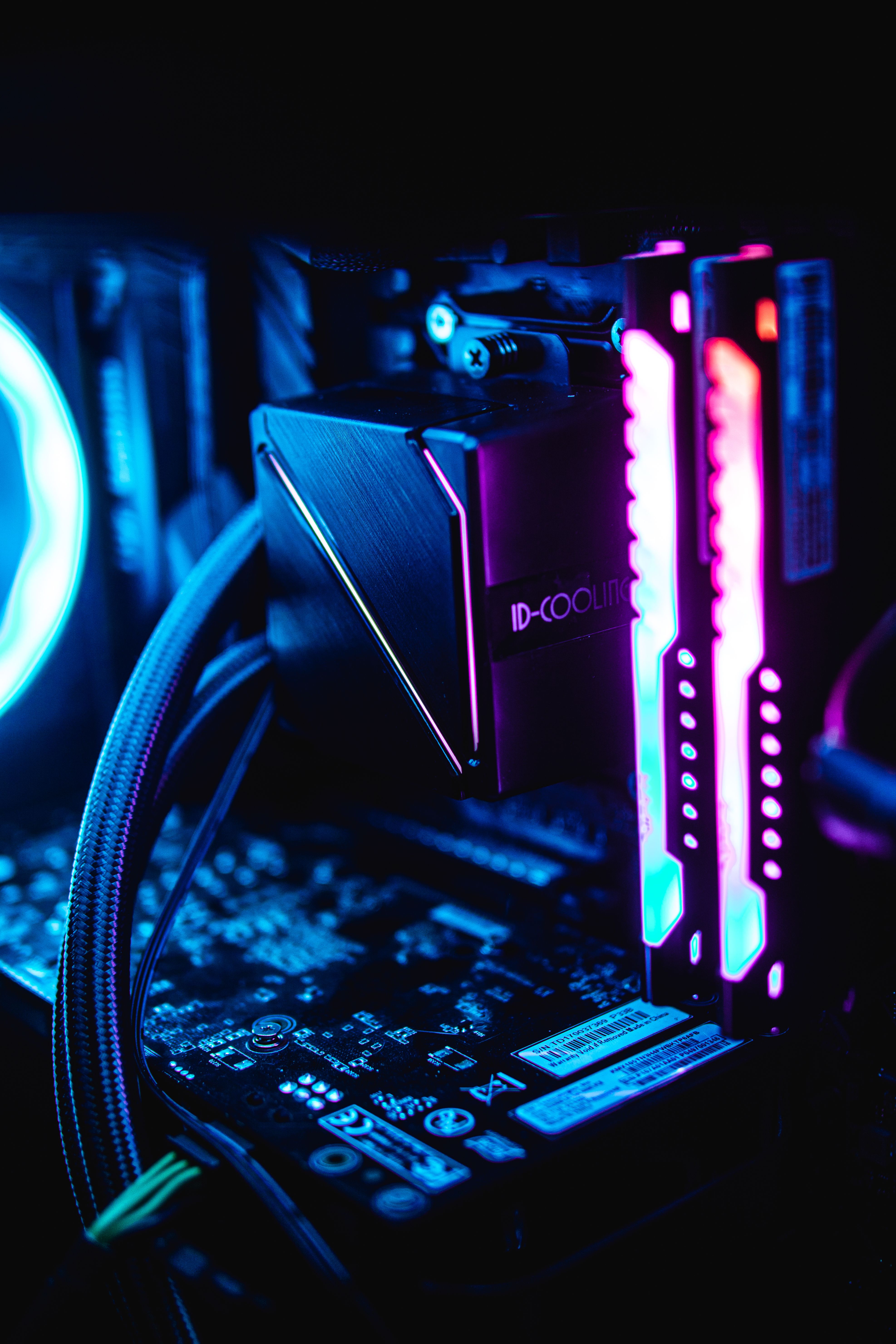 close-up-of-rgb-lit-pc-components-showcasing-vibrant-blue-and-pink-hues-in-a-dar - eathan-hood (pexels)