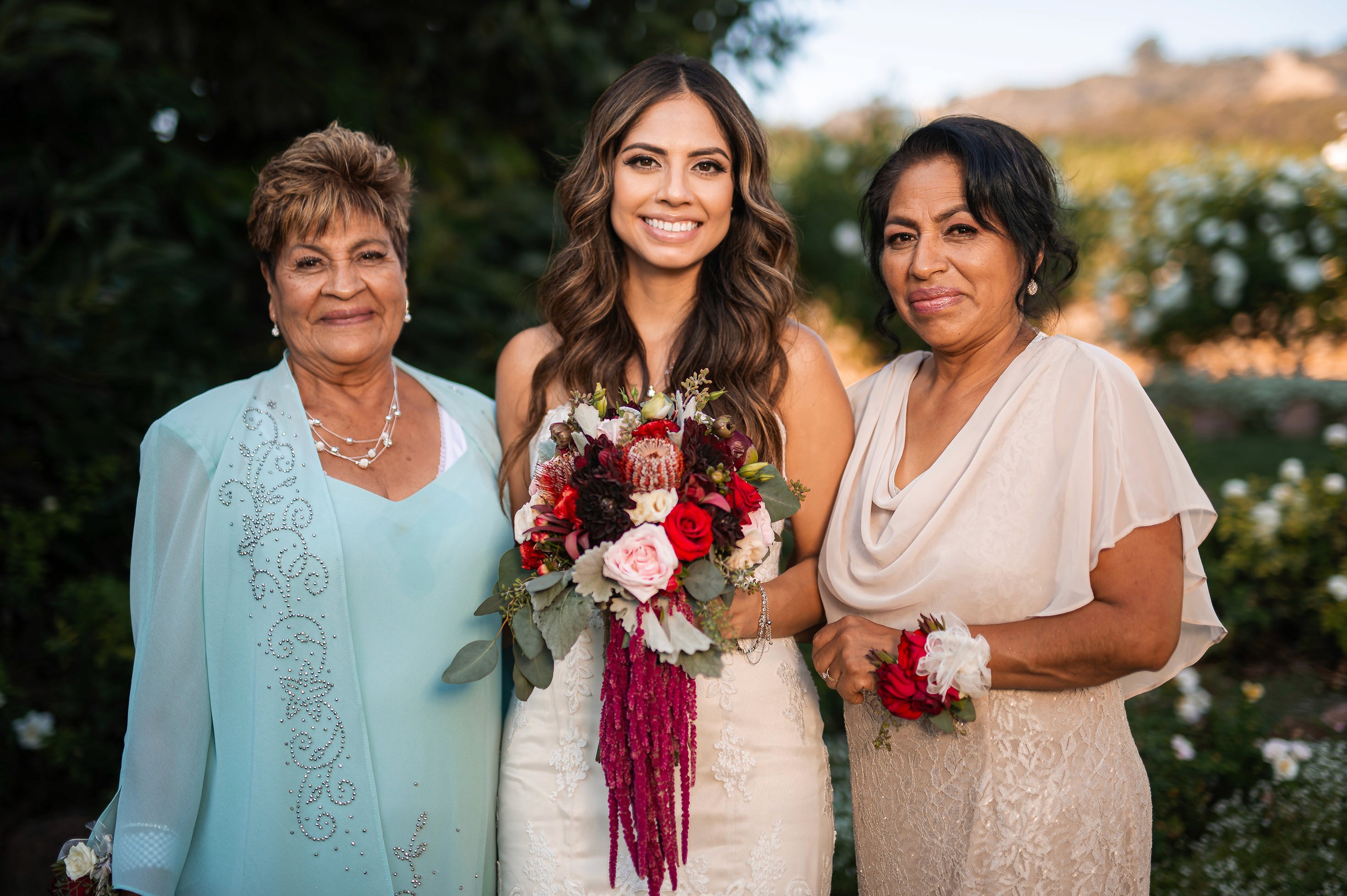 Flat lay wedding details with bouquet, rings, and sparkling bridal heels